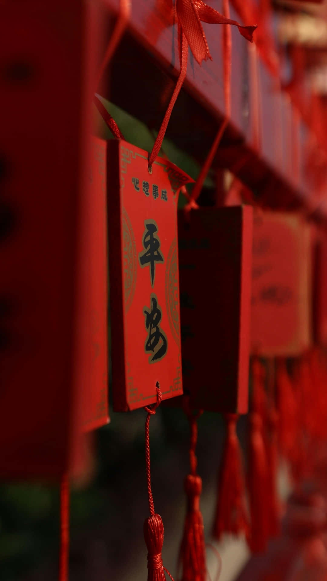 red spring couplets, black Chinese characters, red ribbons, Full HD Phone Wallpaper