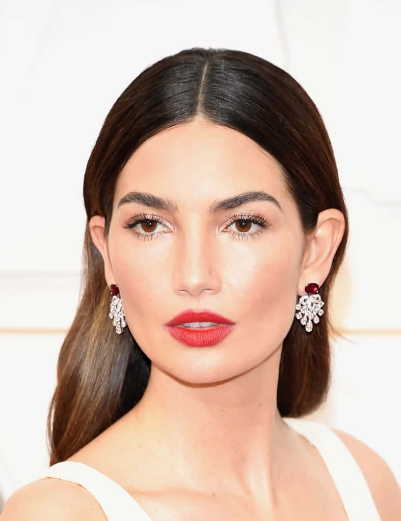 spring makeup, bold red lips, sparkling red and diamond earrings, SD Phone Wallpaper
