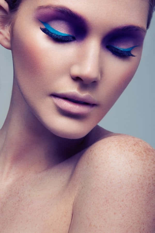 vibrant spring makeup, bold blue eyeliner, purple eyeshadow, SD Phone Wallpaper