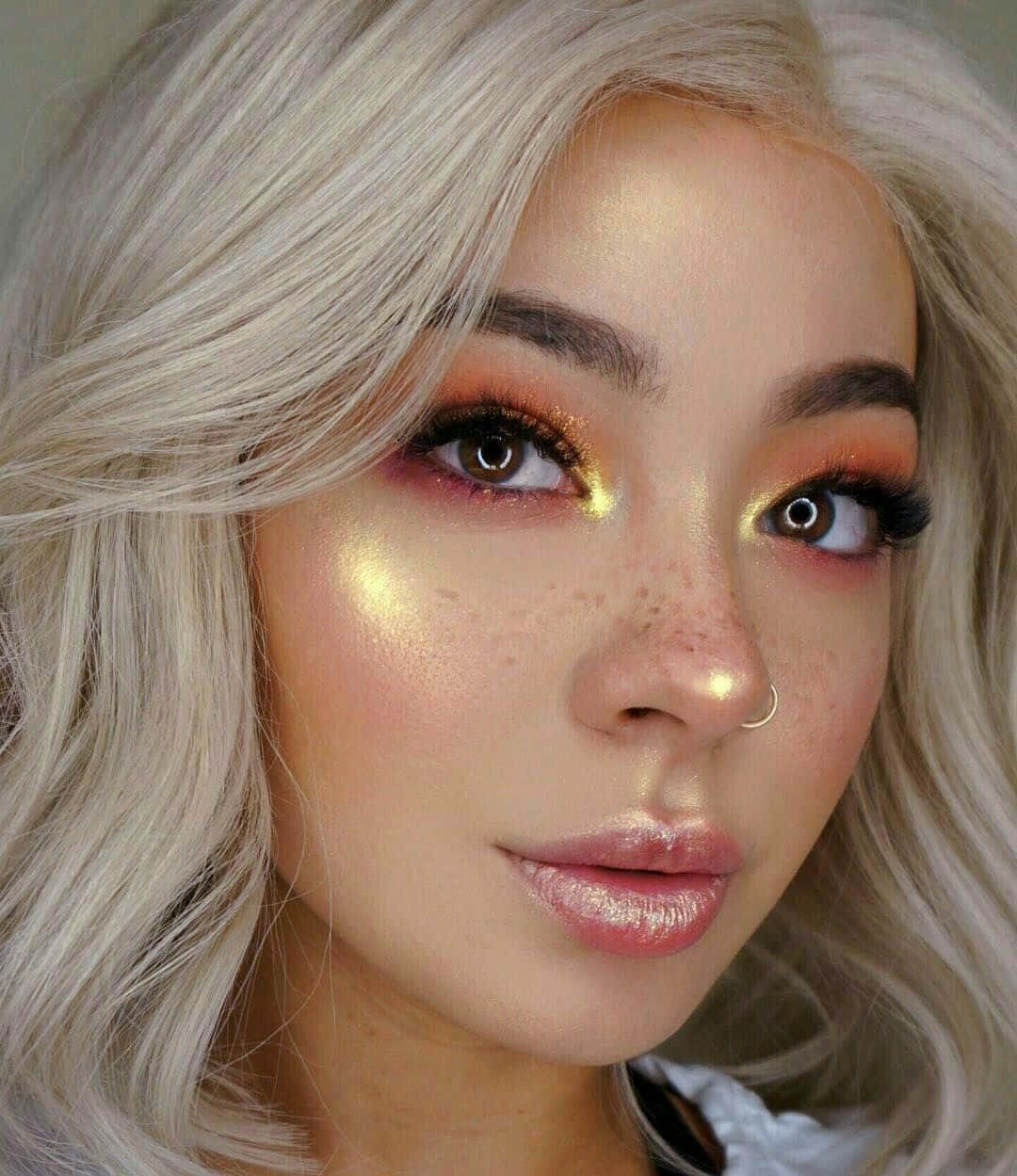 platinum blonde hair, glittery gold eye makeup, orange eye makeup, SD Phone Wallpaper