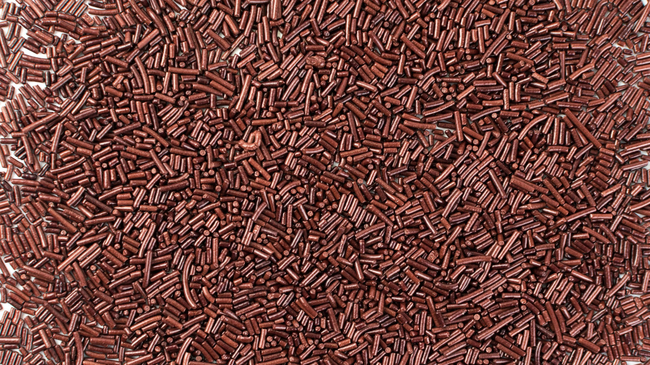 chocolate sprinkles, rich brown, cylindrical shapes, 2K Desktop Wallpaper