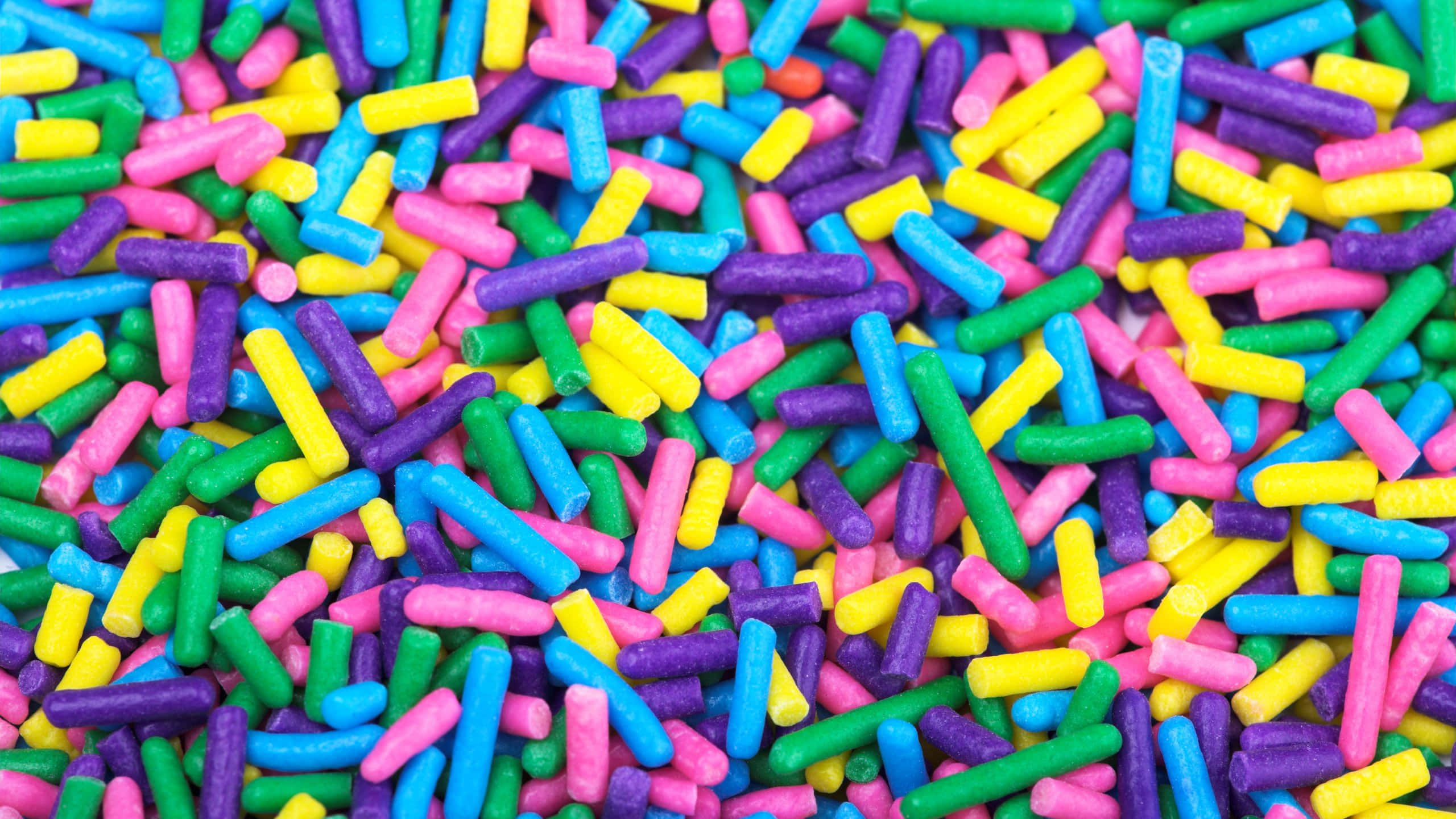 colorful cylindrical sprinkles, pink, yellow, 2K Desktop Wallpaper
