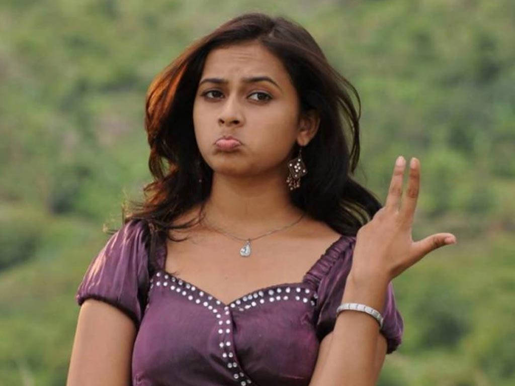Sri Divya, purple dress, playful pout, SD Desktop Wallpaper