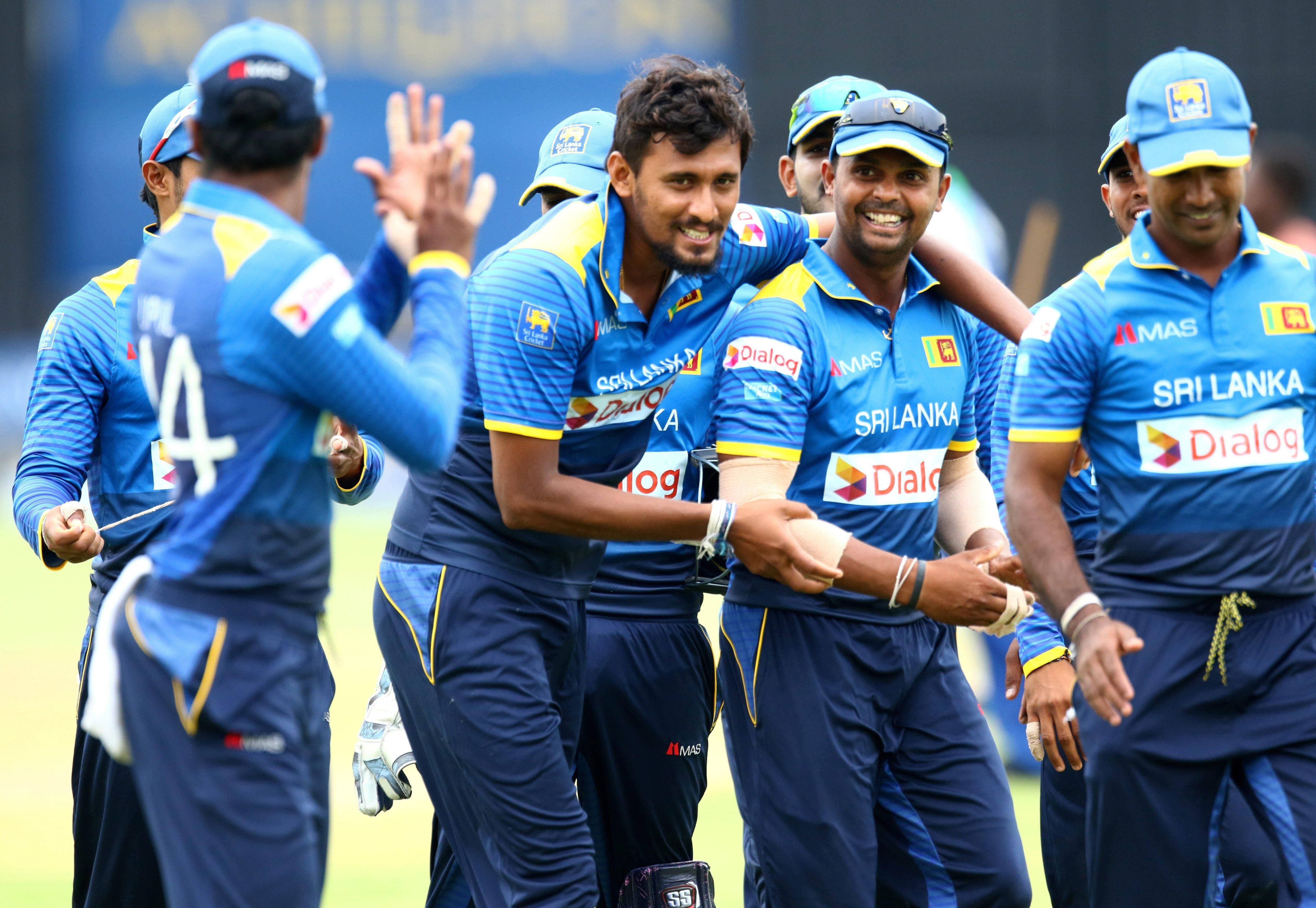 Sri Lanka Cricket Team, blue uniforms, sunny field, 4K Desktop Wallpaper