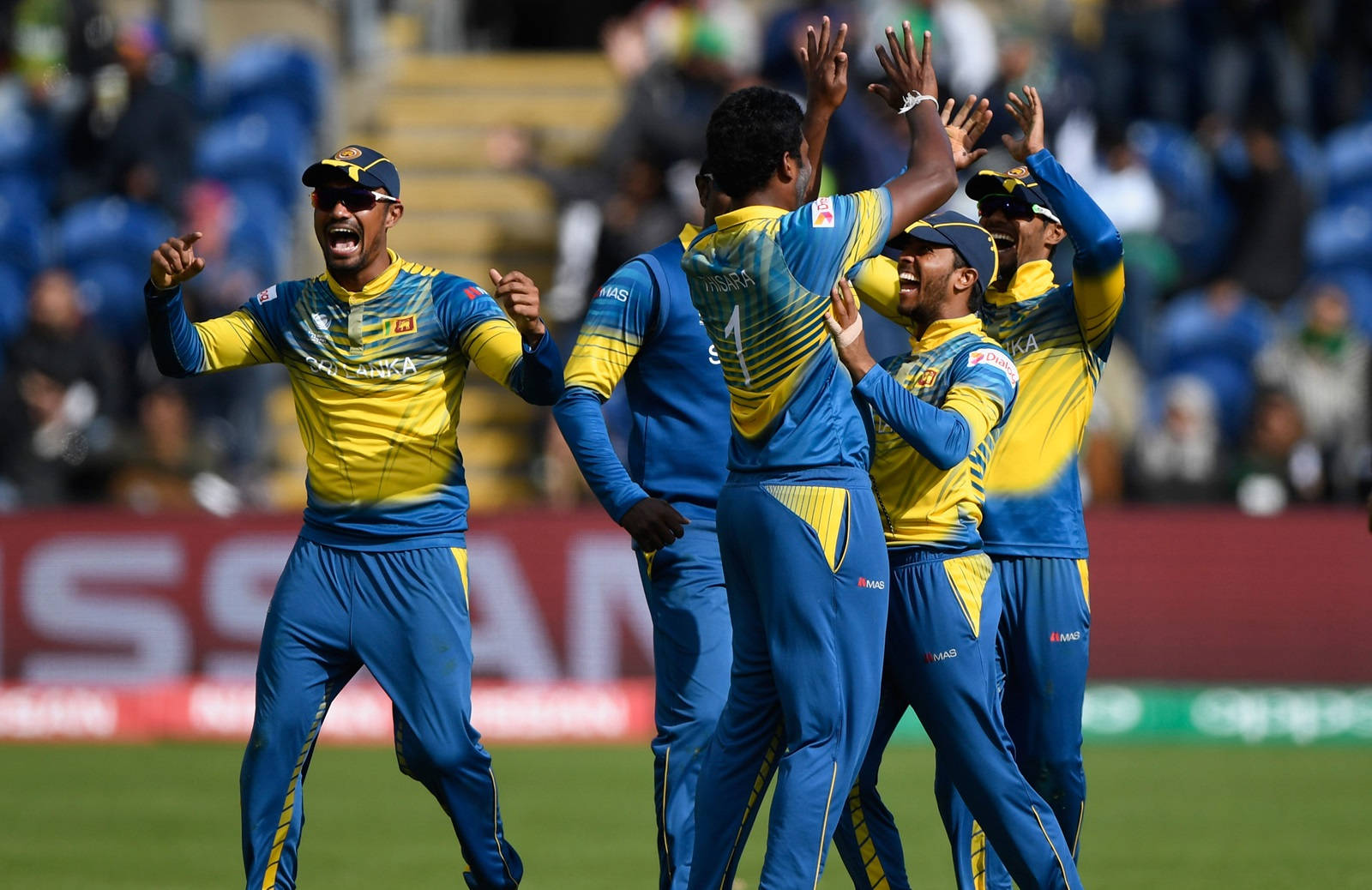 Sri Lanka Cricket, blue and yellow uniforms, sunlit green field, HD Desktop Wallpaper