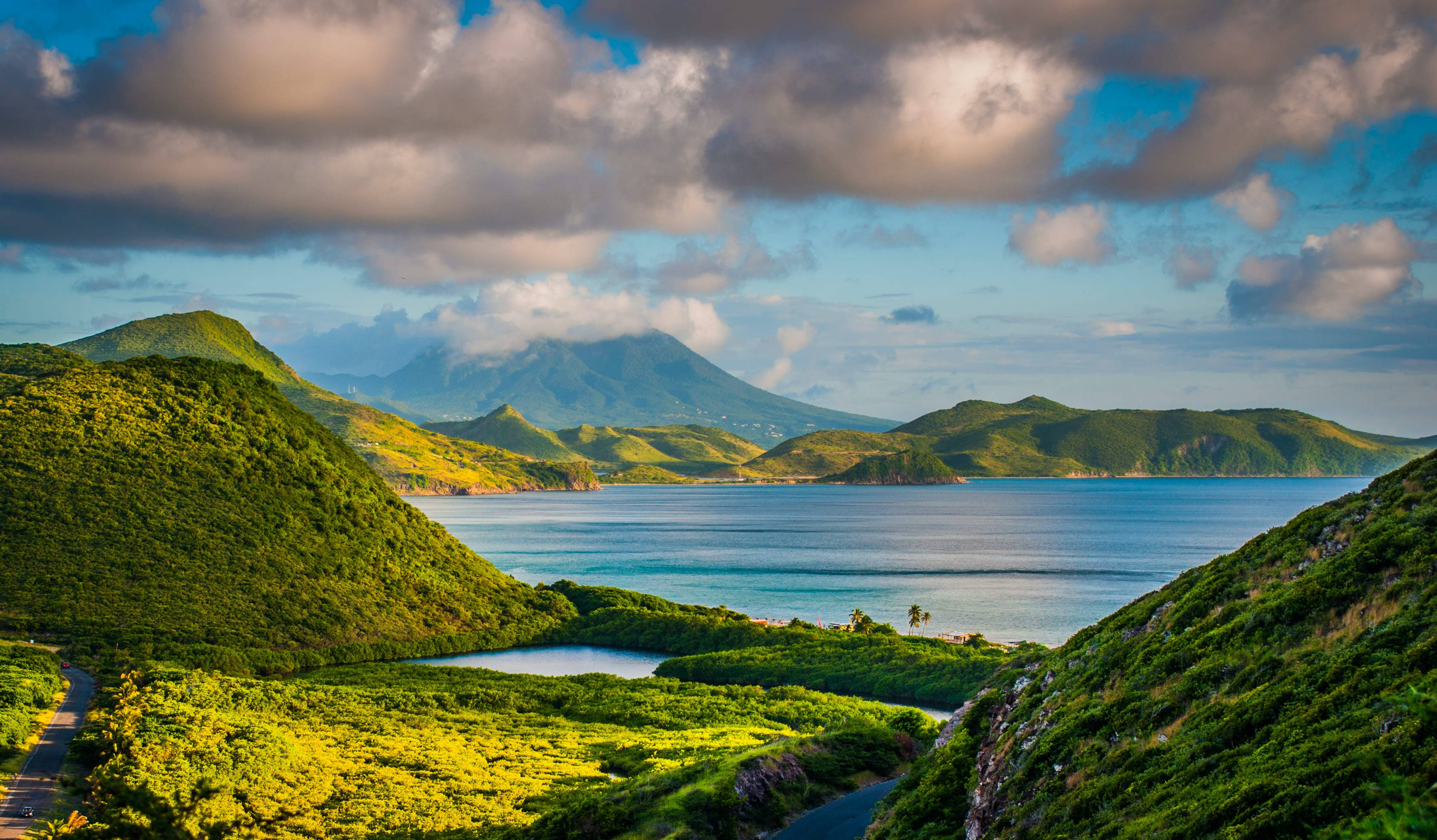 St Kitts And Nevis, vibrant green hills, serene turquoise bay, 2K Desktop Wallpaper