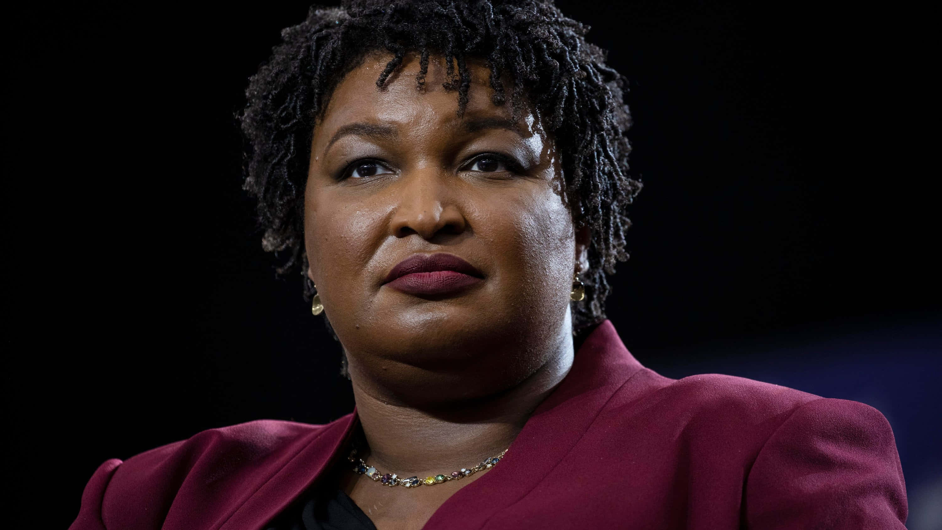 Stacey Abrams, maroon blazer, short curly hair, 2K Desktop Wallpaper
