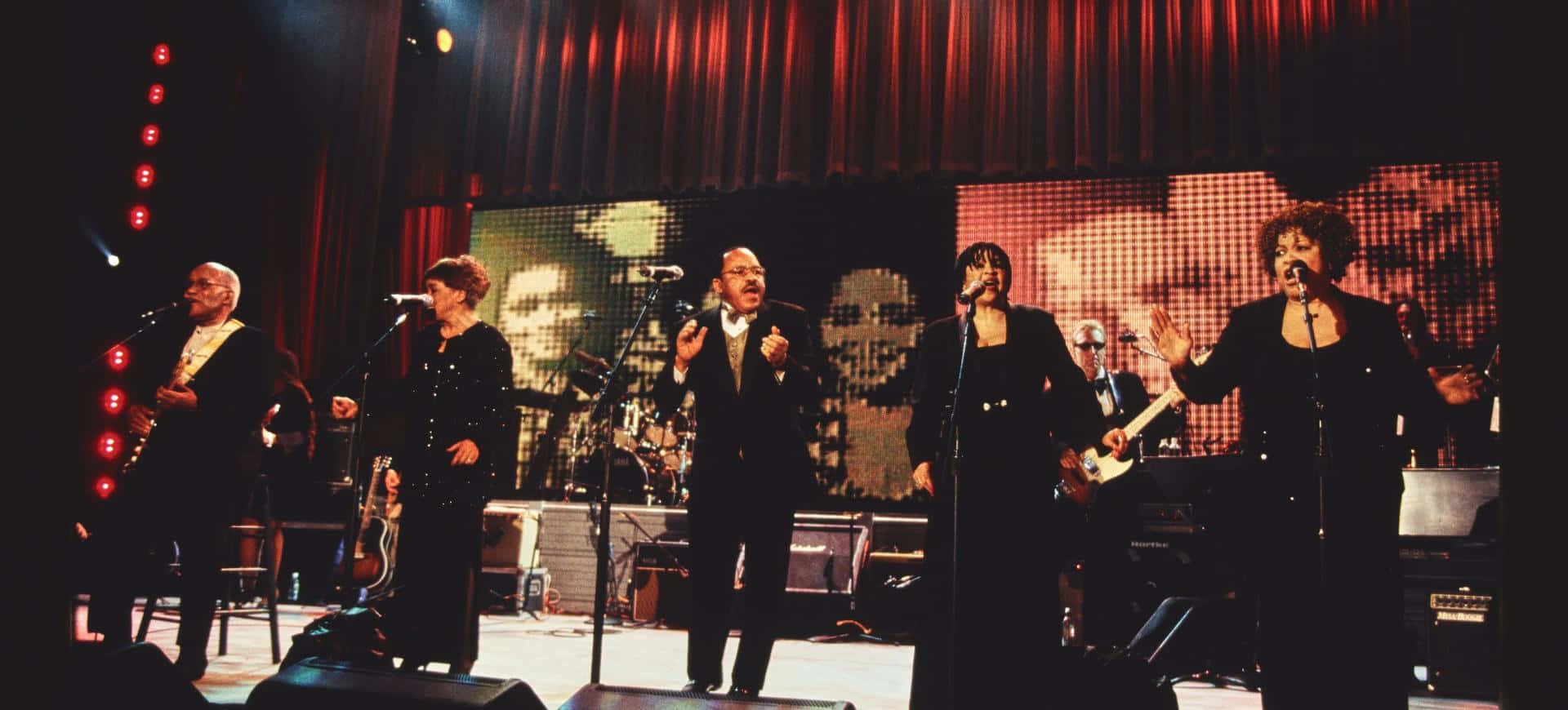 The Staple Singers, 2000 Live Concert, dimly lit stage, Full HD Desktop Wallpaper