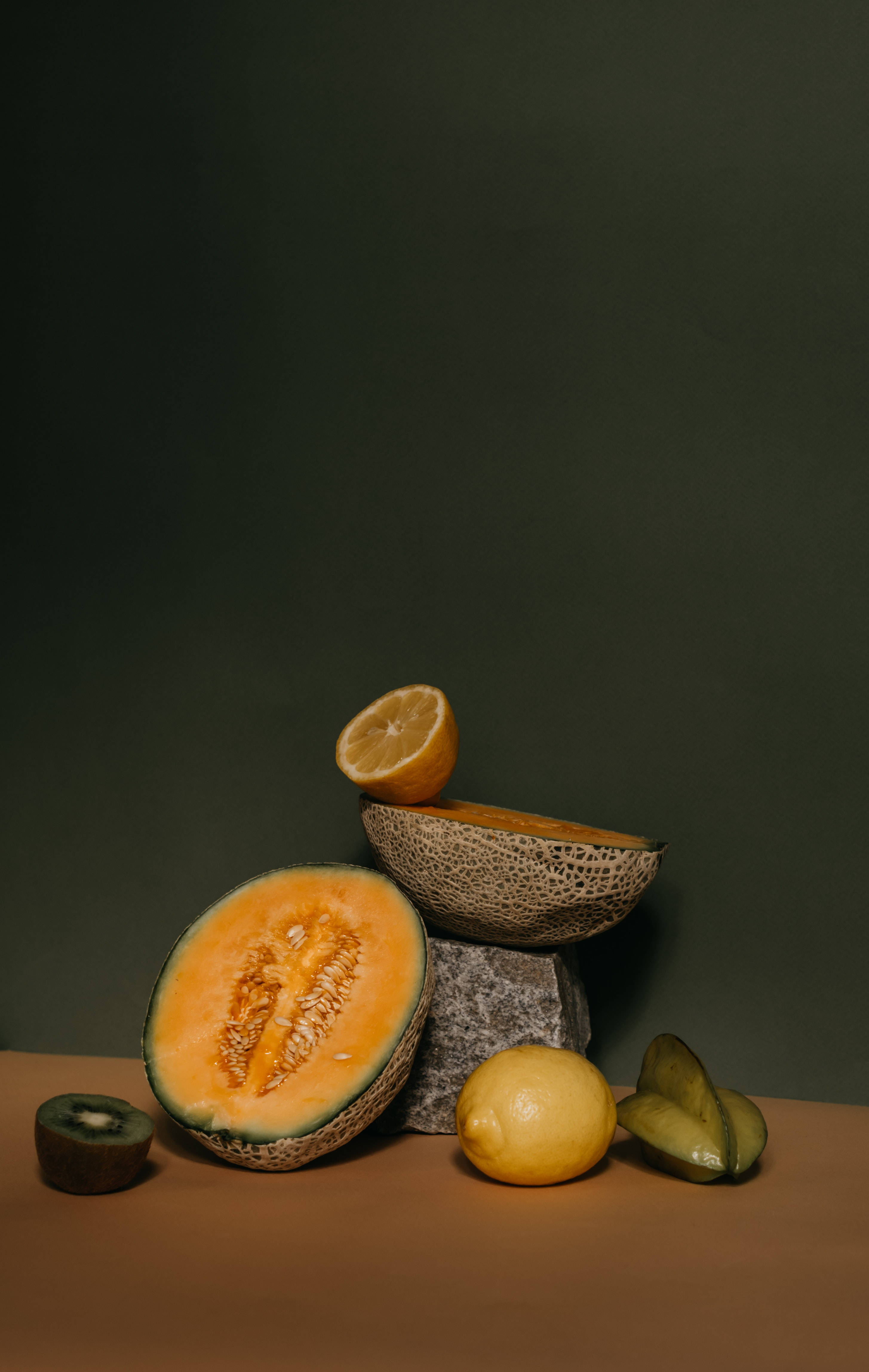 Star Fruit, brown table, stone, 4K Phone Wallpaper