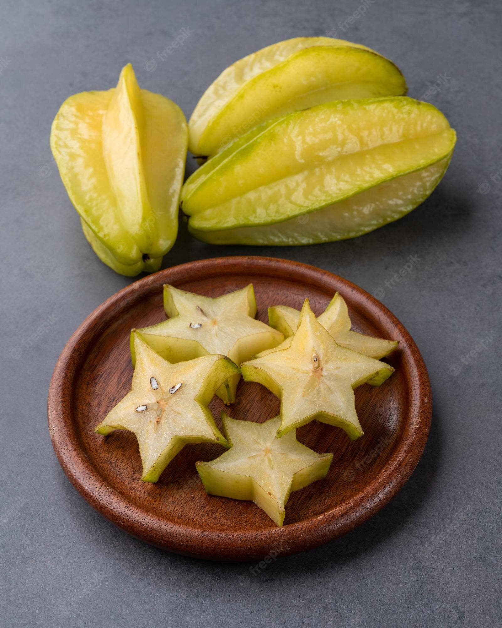 Star Fruit, wooden plate, gray surface, Full HD Phone Wallpaper