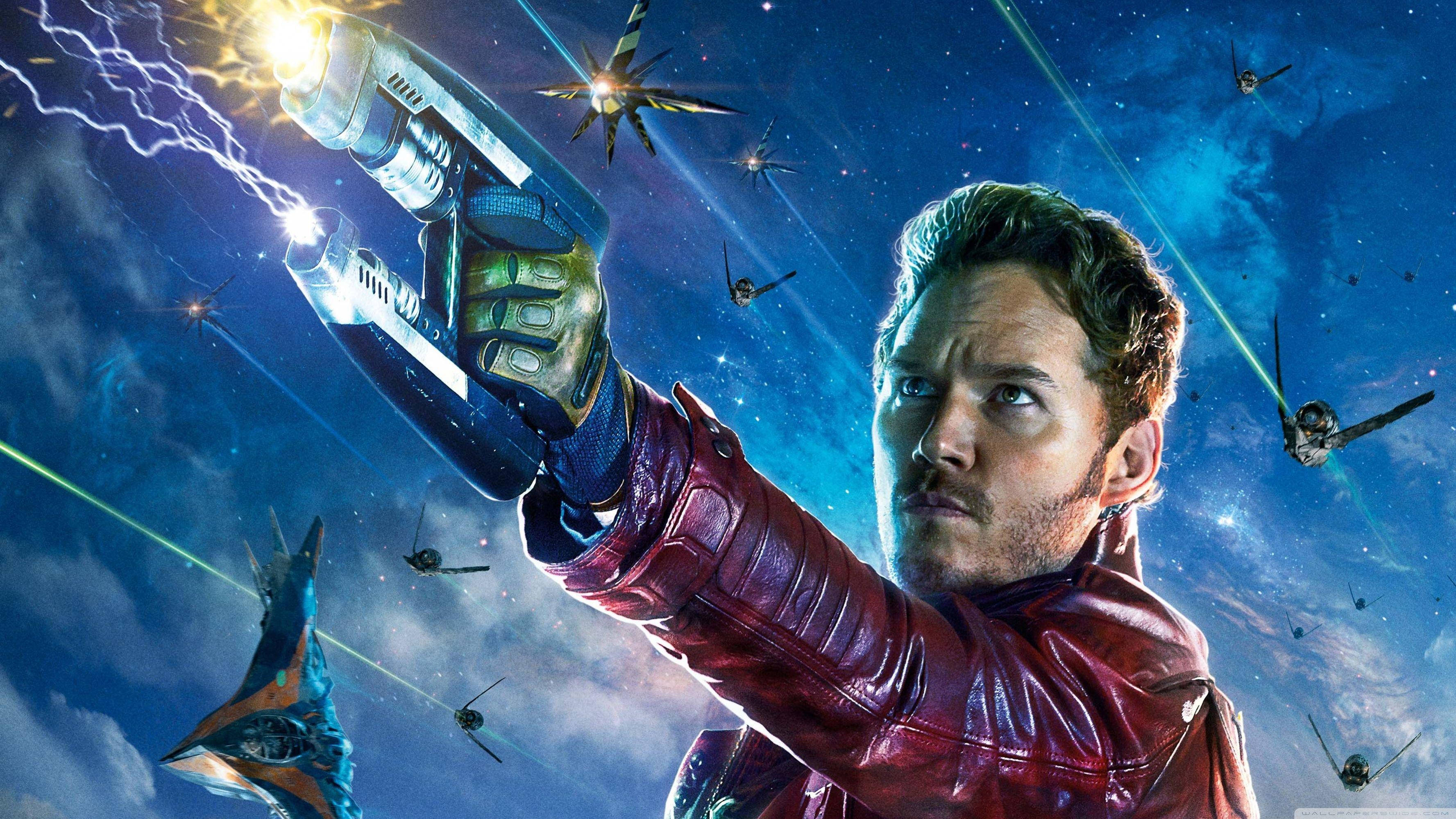 Star-Lord, glowing weapon, star-filled battle, 2K Desktop Wallpaper