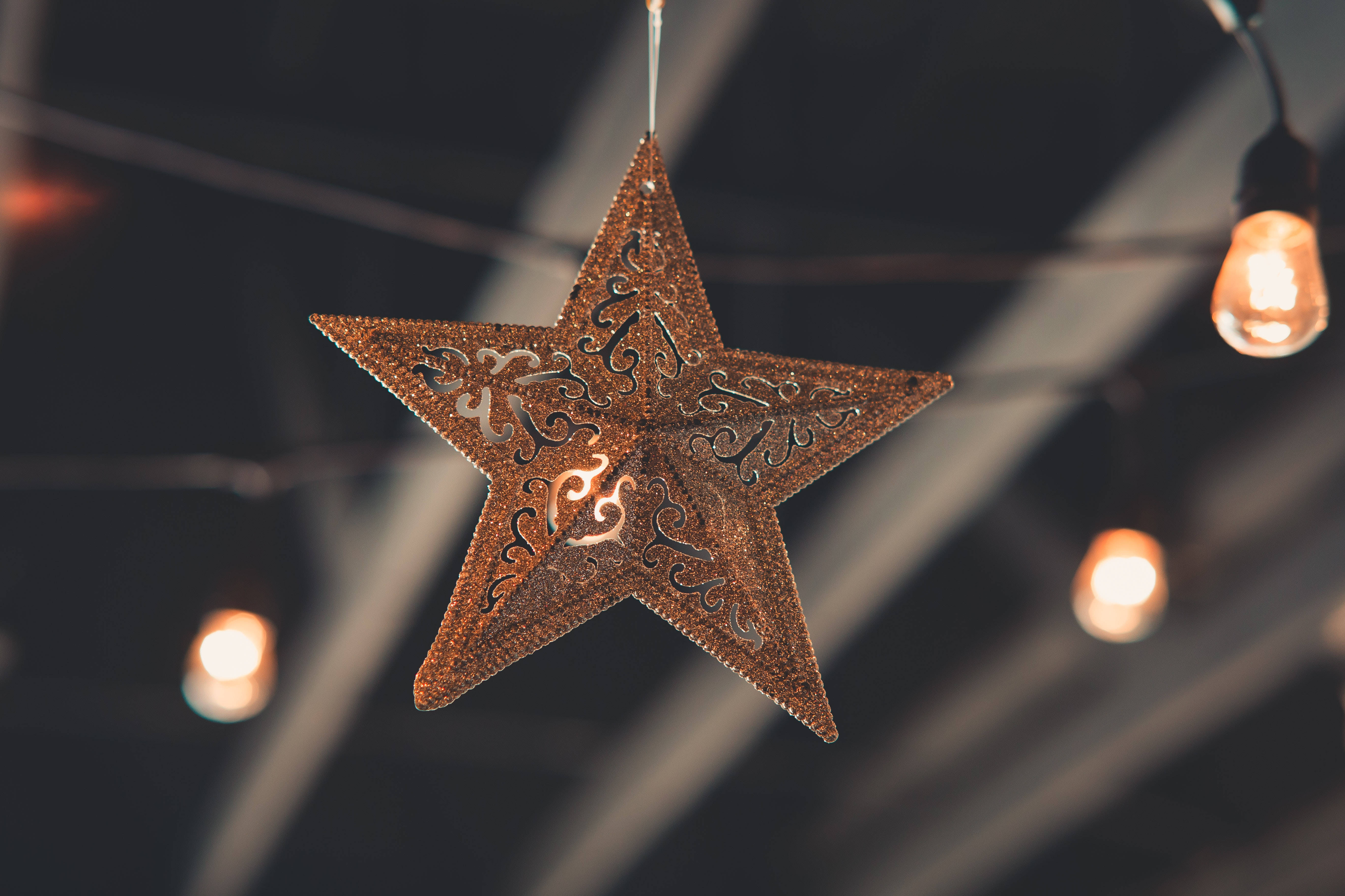 high resolution star hanging light, bronze star ornament, dark ceiling, 5K Desktop Wallpaper