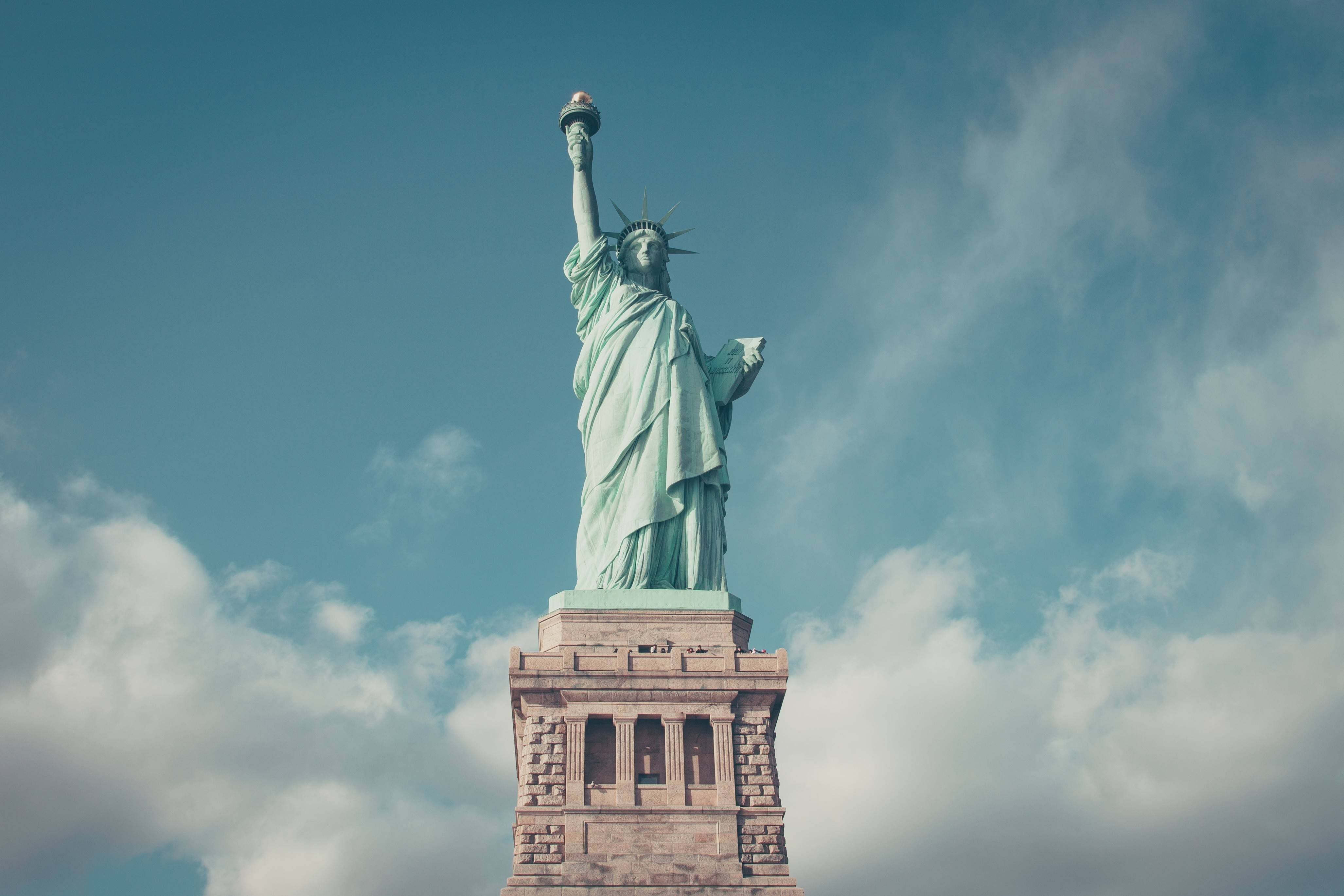 Statue Of Liberty, blue sky, scattered white clouds, 4K Desktop Wallpaper