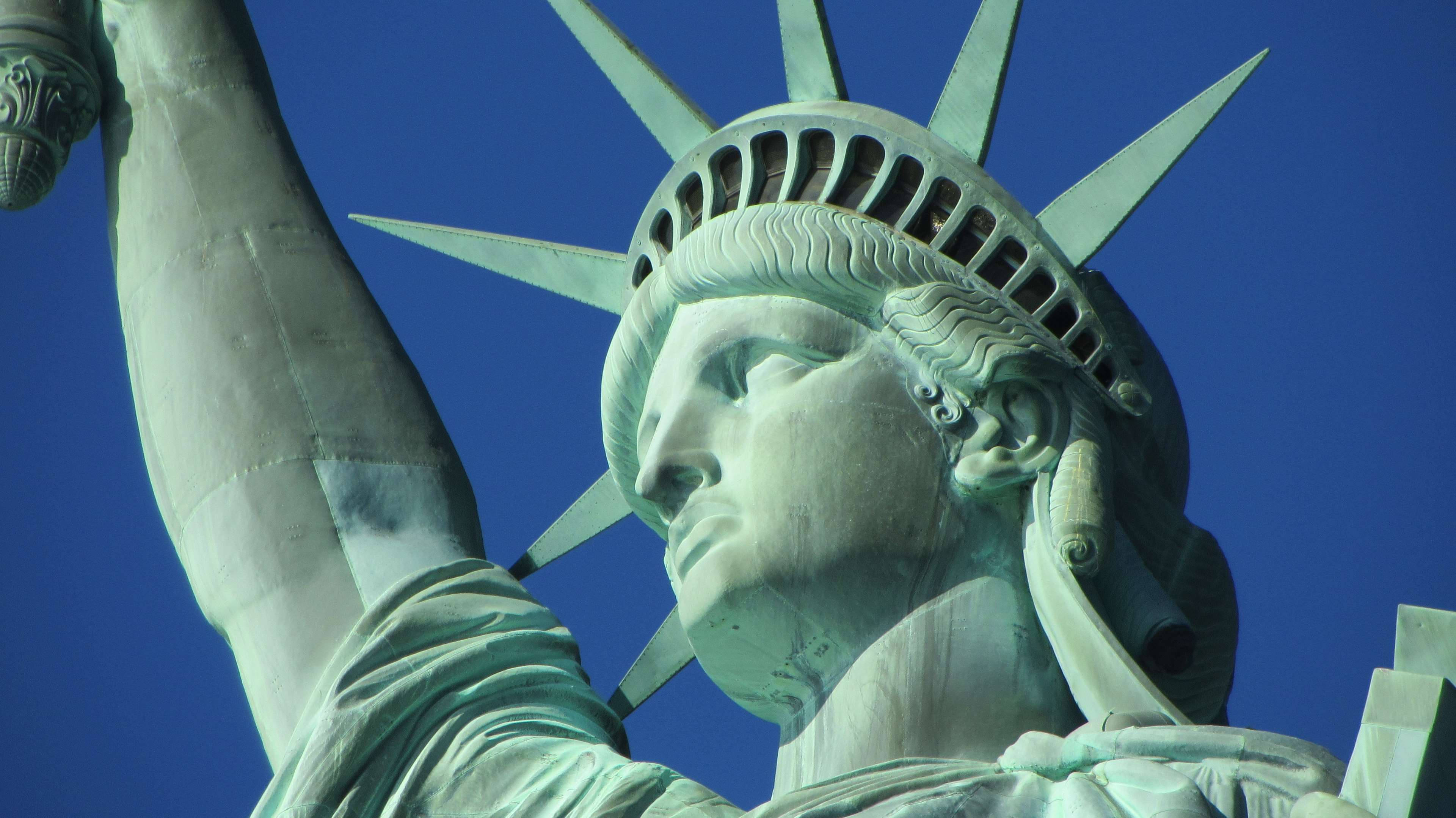 Statue Of Liberty, face, raised torch, 4K Desktop Wallpaper