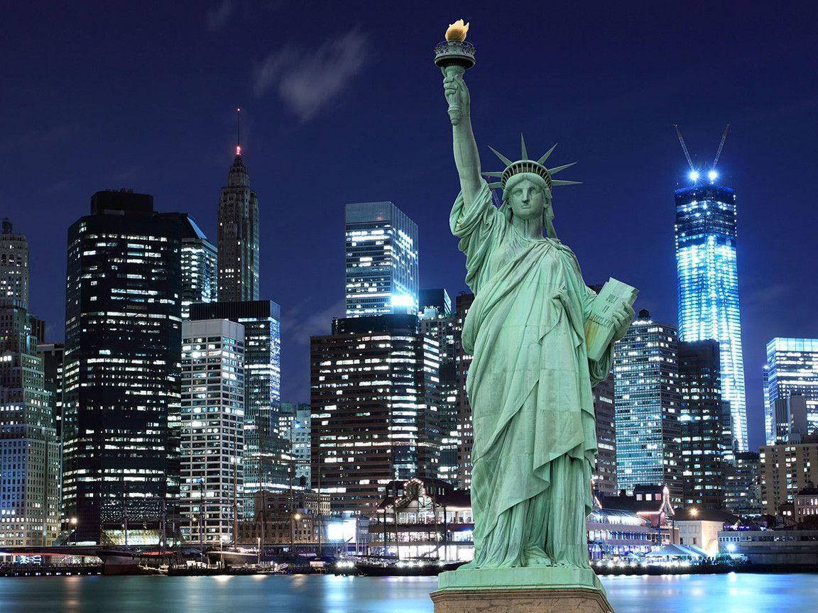 Statue Of Liberty, vibrant night skyline, glowing skyscrapers, SD Desktop Wallpaper