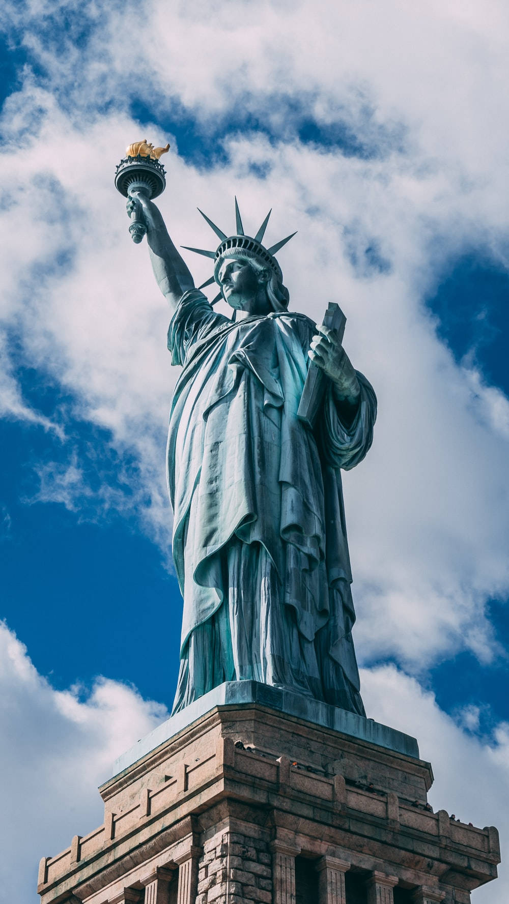 Statue Of Liberty, vibrant blue sky, fluffy white clouds, HD Phone Wallpaper