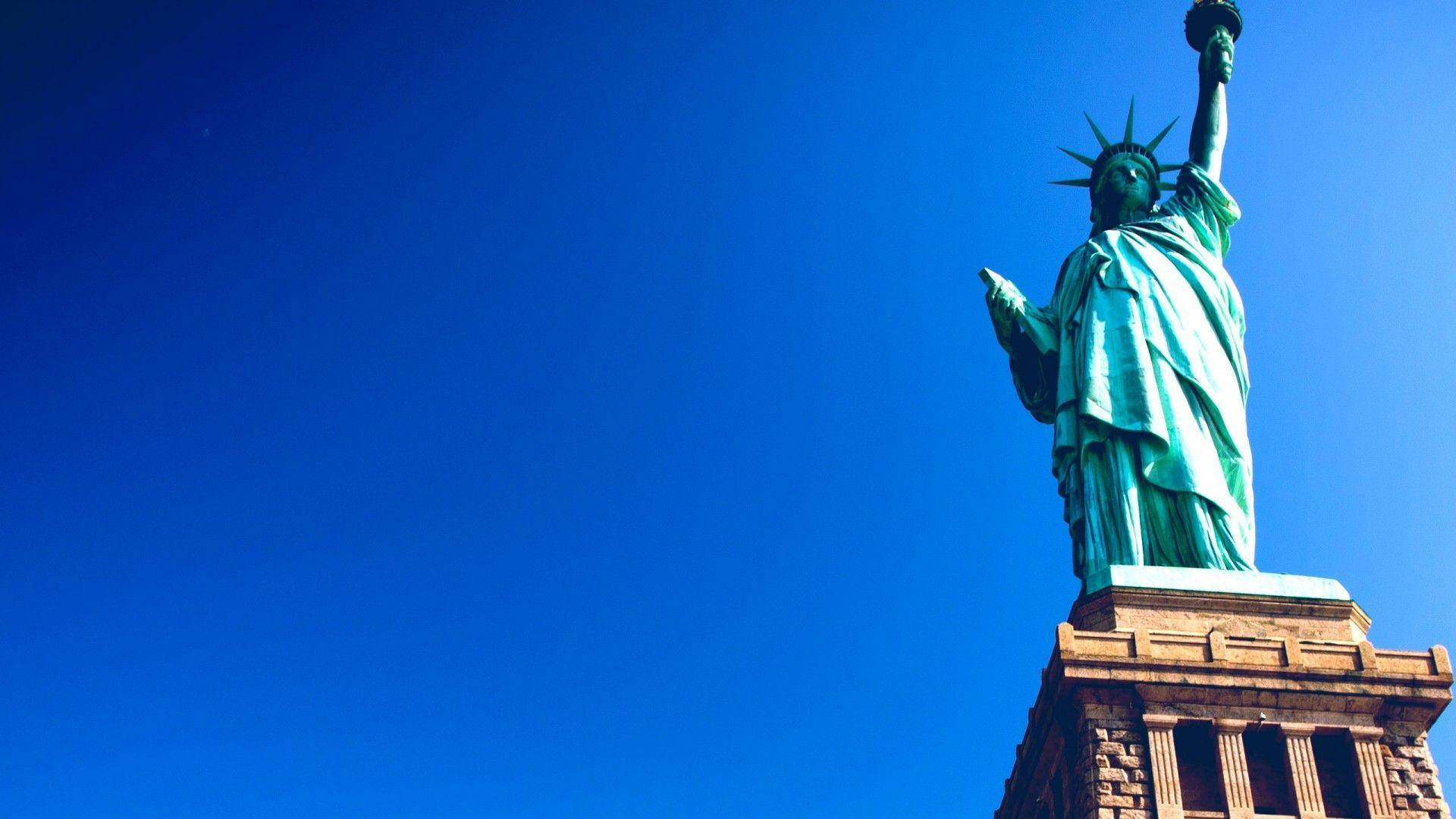 Statue Of Liberty, clear blue sky, torch, Full HD Desktop Wallpaper