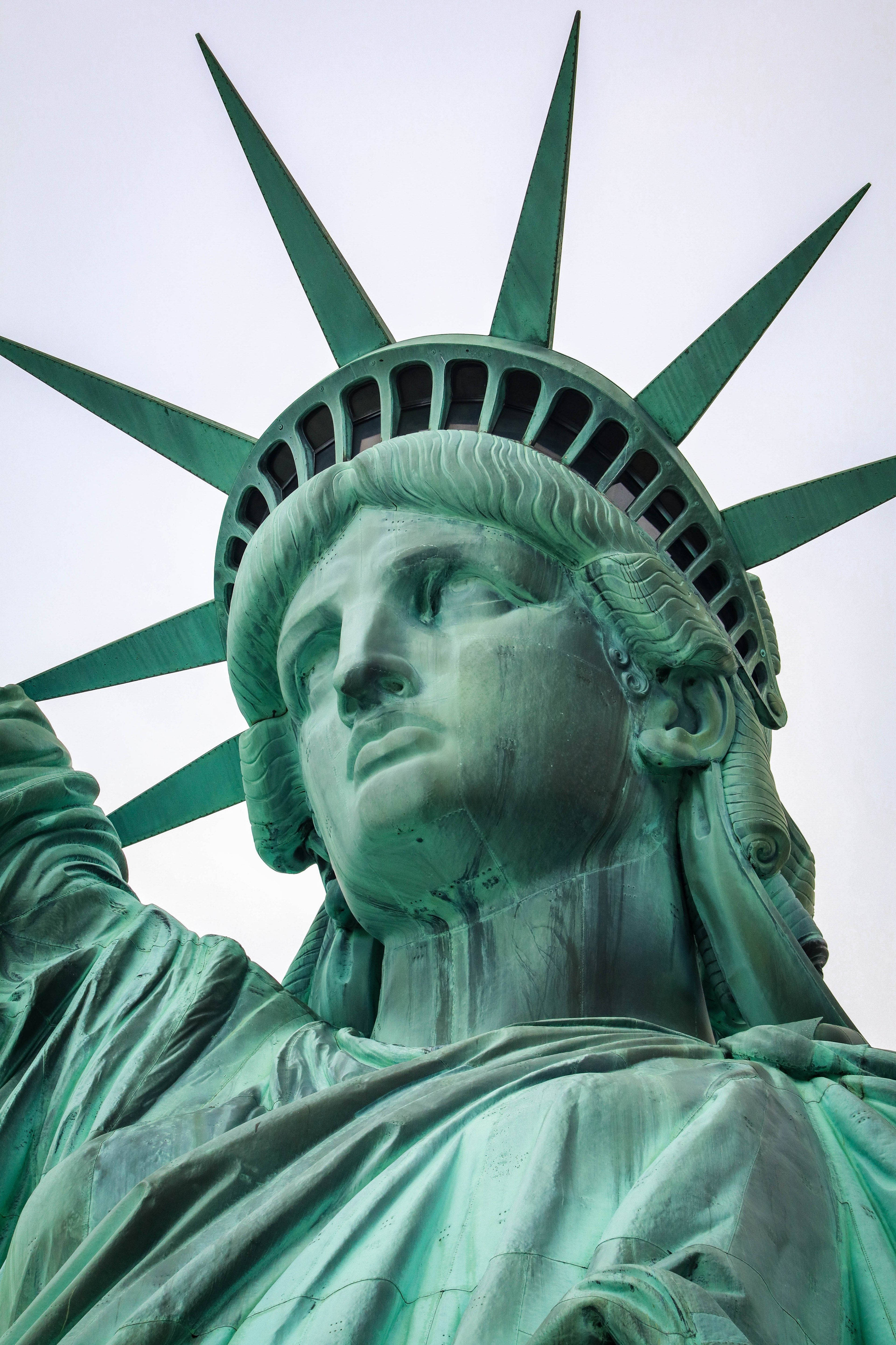 Statue Of Liberty, weathered green copper face, crown, 5K Phone Wallpaper
