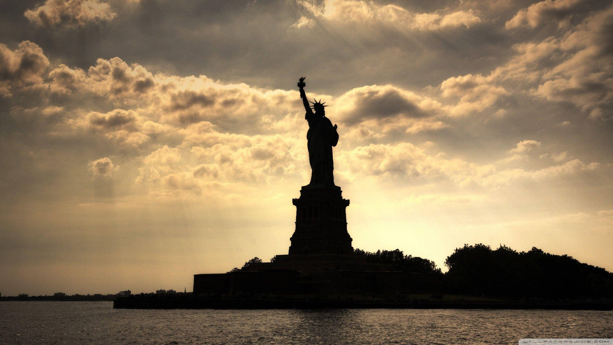 Statue Of Liberty, golden sunset sky, silhouette, 2K Desktop Wallpaper
