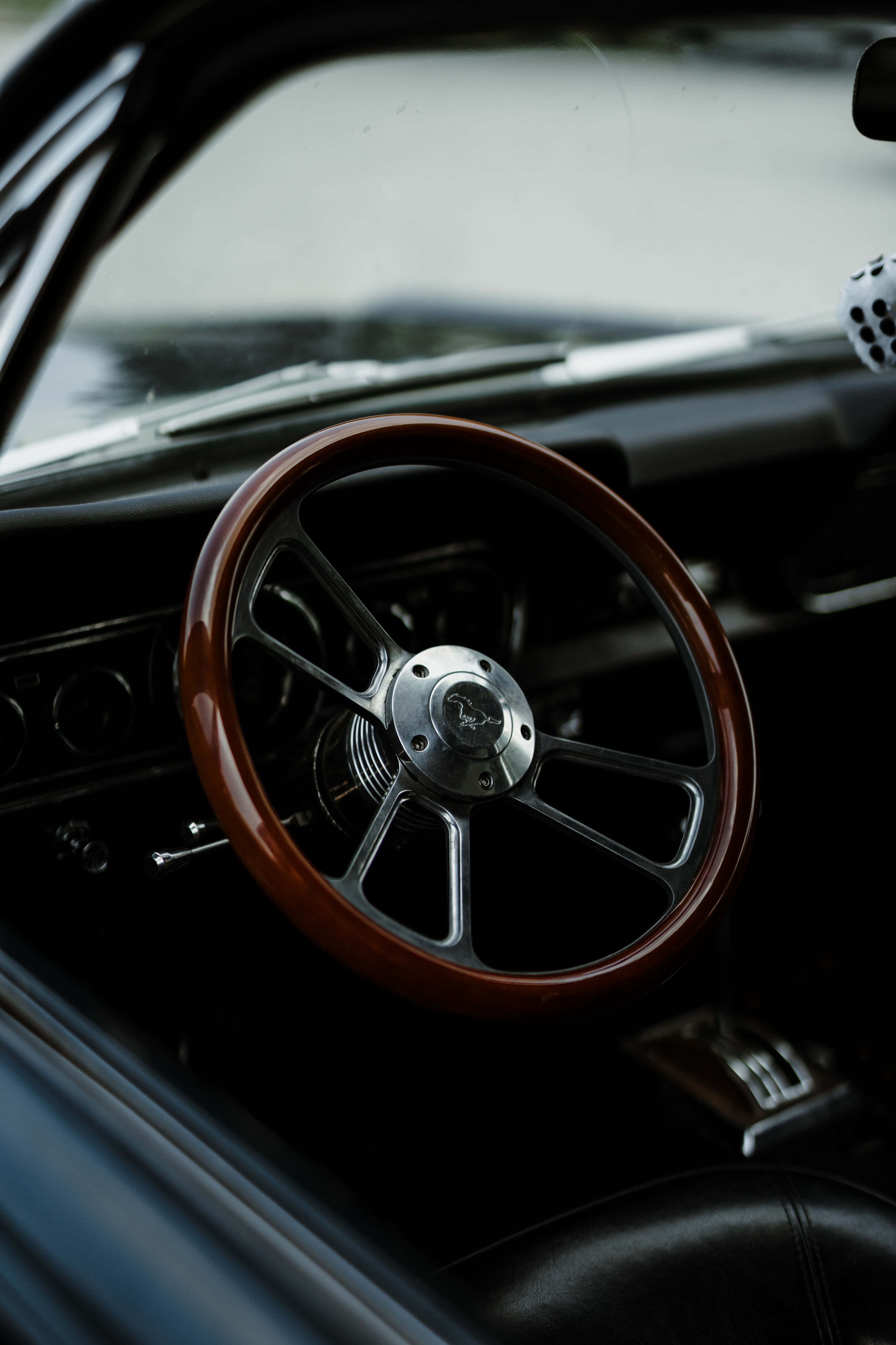wooden steering wheel, chrome accents, classic Ford Mustang emblem, 5K Phone Wallpaper