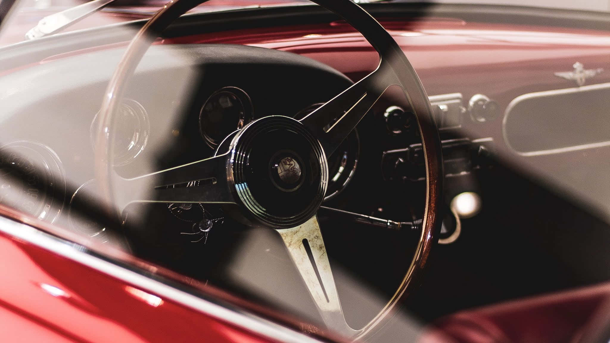 vintage red car, black steering wheel, chrome accents, Full HD Desktop Wallpaper