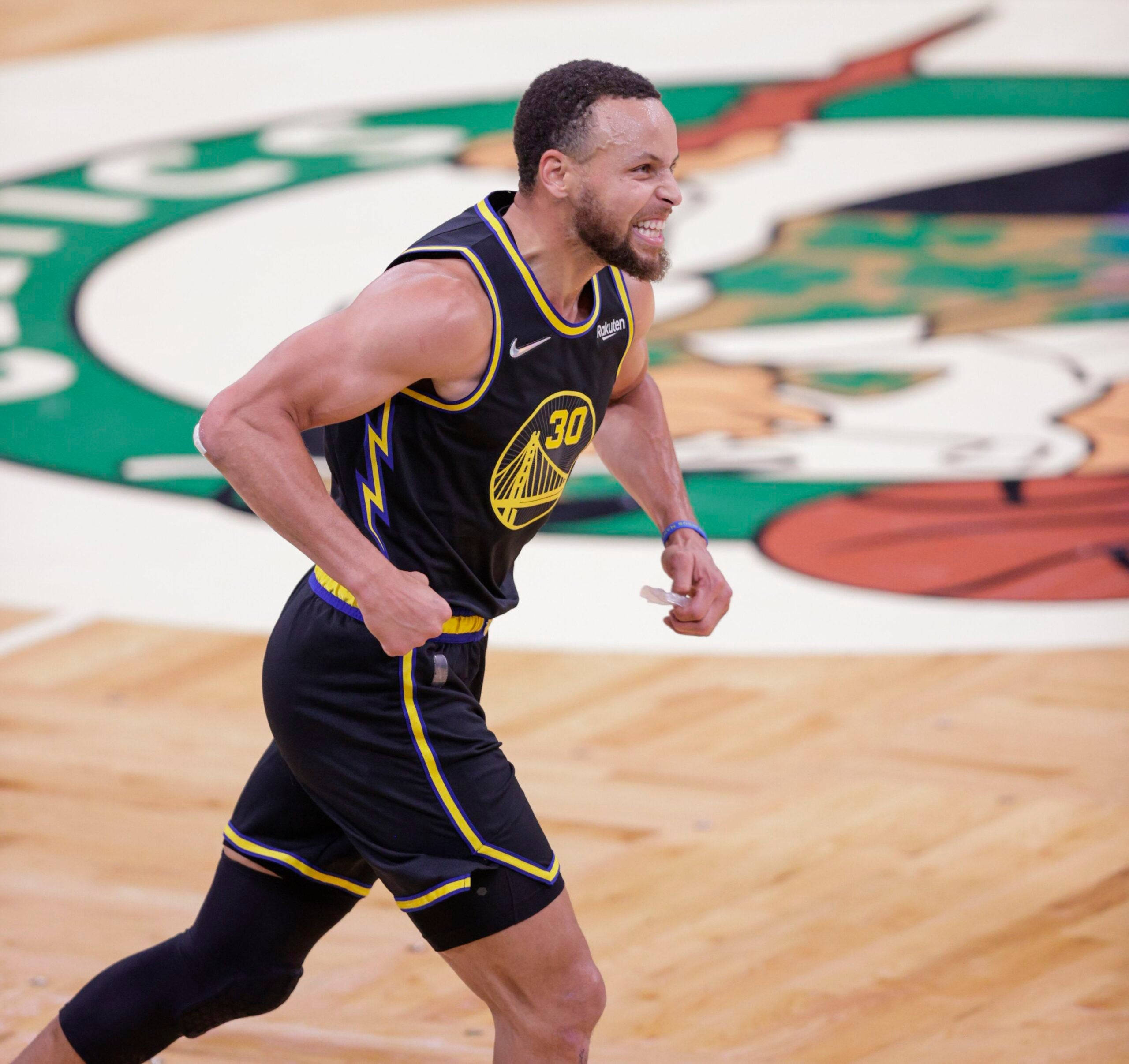 Steph Curry, black and yellow Warriors jersey, hardwood court, 2K Desktop Wallpaper