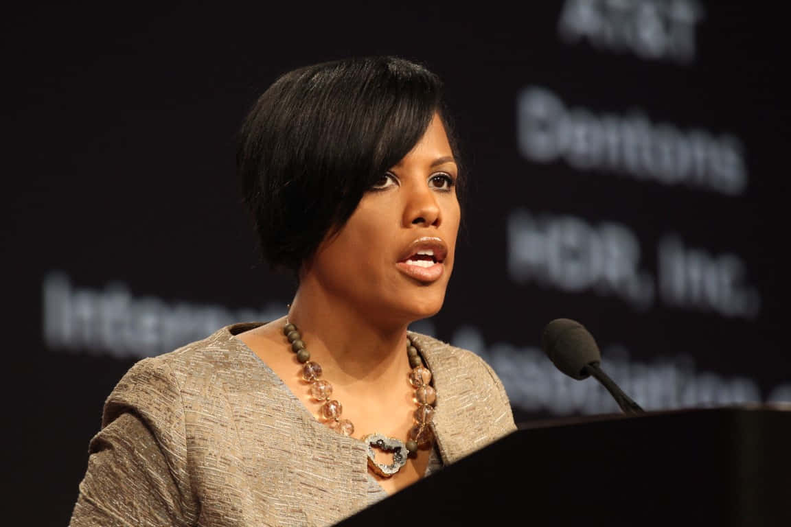 Stephanie Rawlings Blake, podium, dark backdrop, SD Desktop Wallpaper