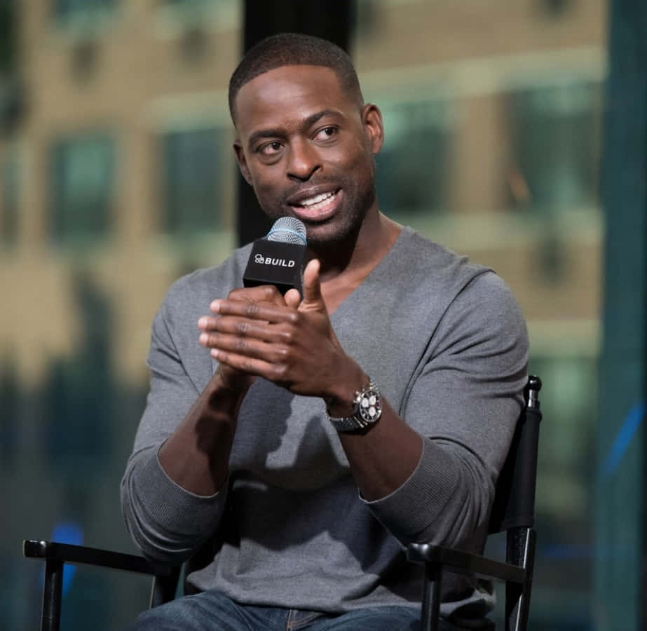 Sterling K Brown, gray sweater, microphone, SD Desktop Wallpaper