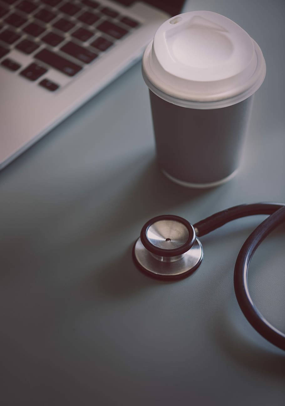 stethoscope coffee cup, laptop, sleek gray desk, HD Phone Wallpaper