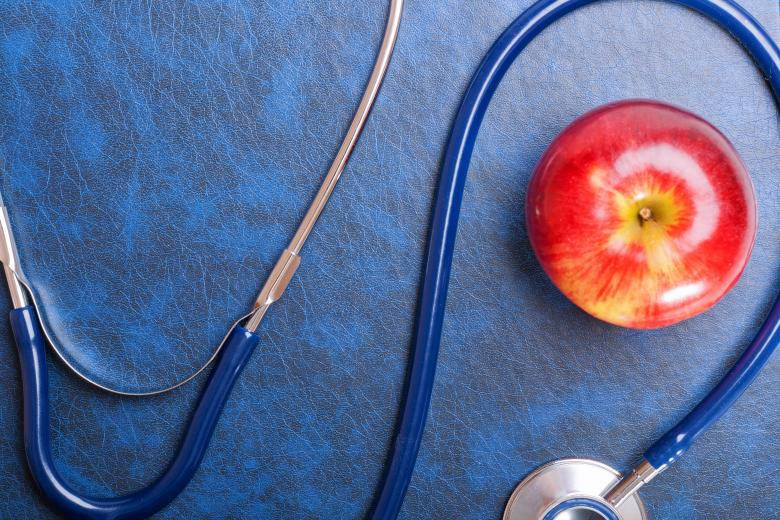 blue stethoscope, vibrant red apple, textured blue leather, SD Desktop Wallpaper
