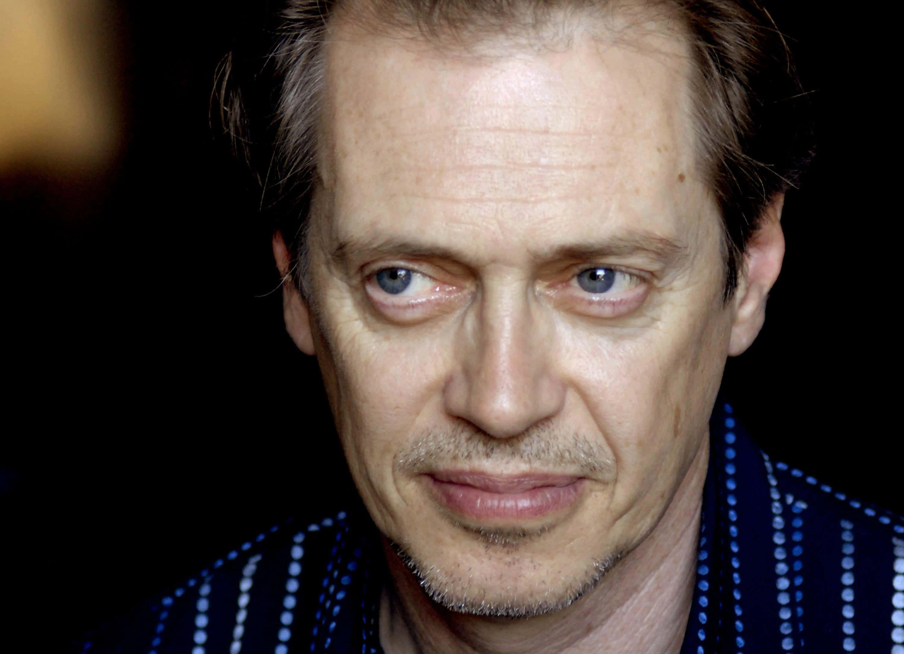 Steve Buscemi, intense blue eyes, serious expression, 2K Desktop Wallpaper