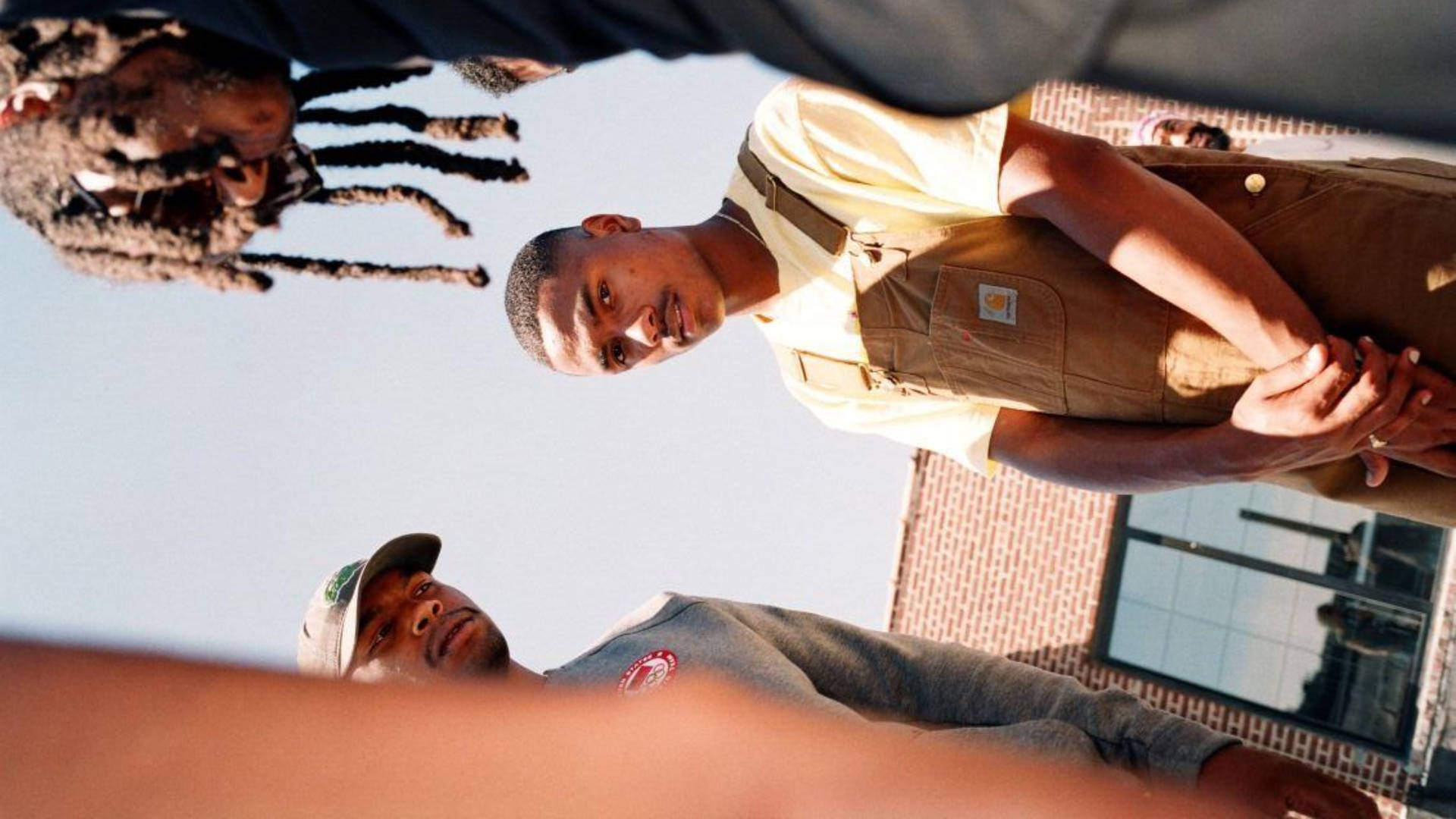 Steve Lacy, brown overalls, brick building, Full HD Desktop Wallpaper