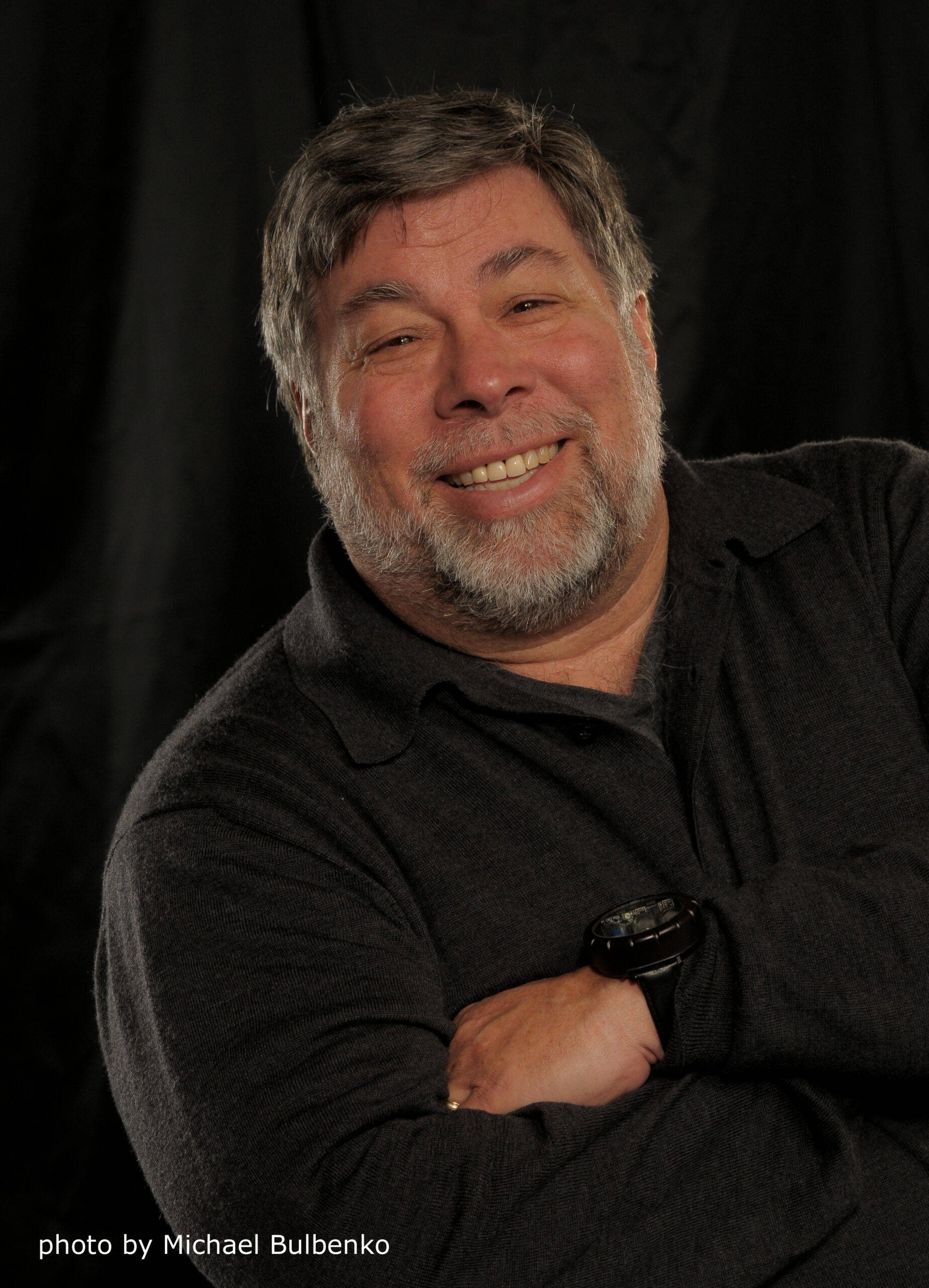 Steve Wozniak, gray beard, dark polo shirt, 2K Phone Wallpaper