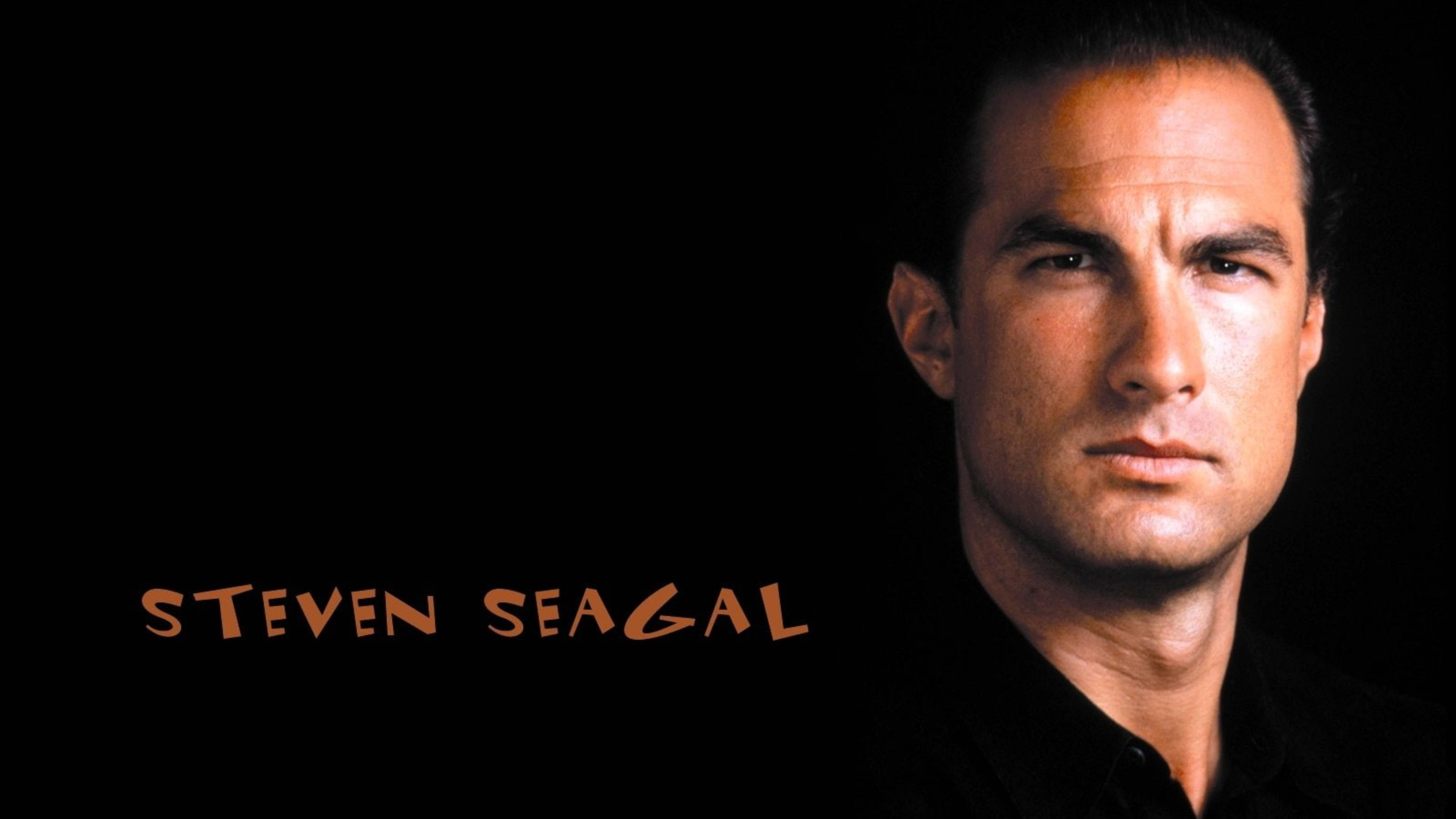Steven Seagal, black background, orange text, 4K Desktop Wallpaper