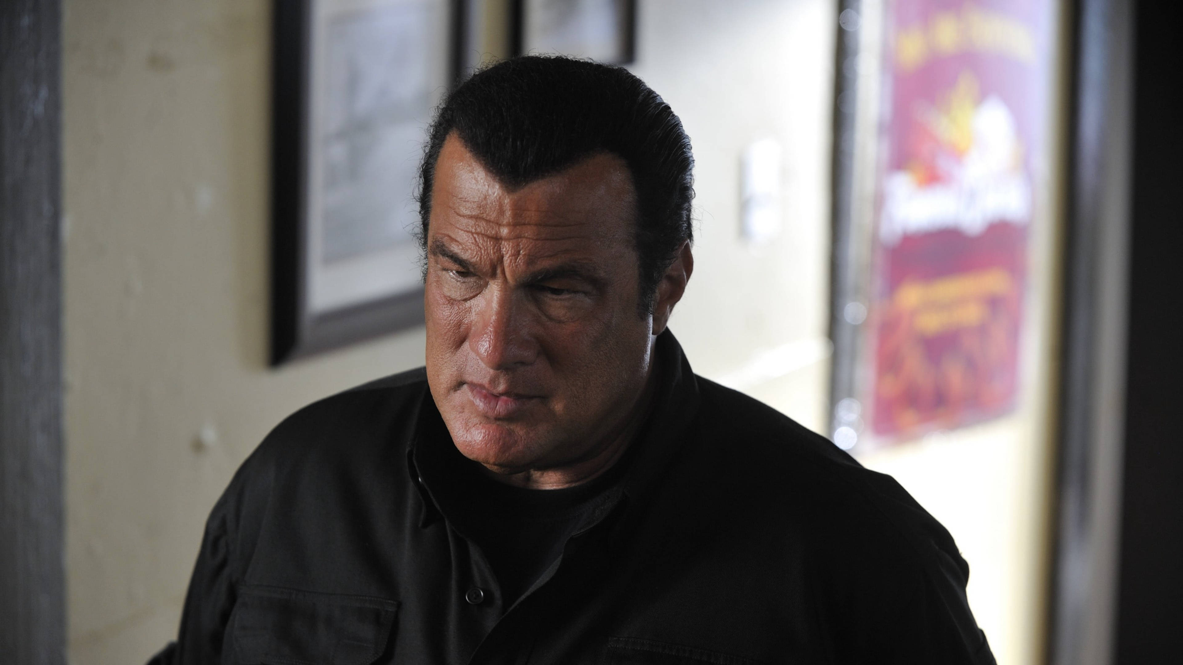 Steven Seagal, black shirt, dimly lit hallway, 4K Desktop Wallpaper