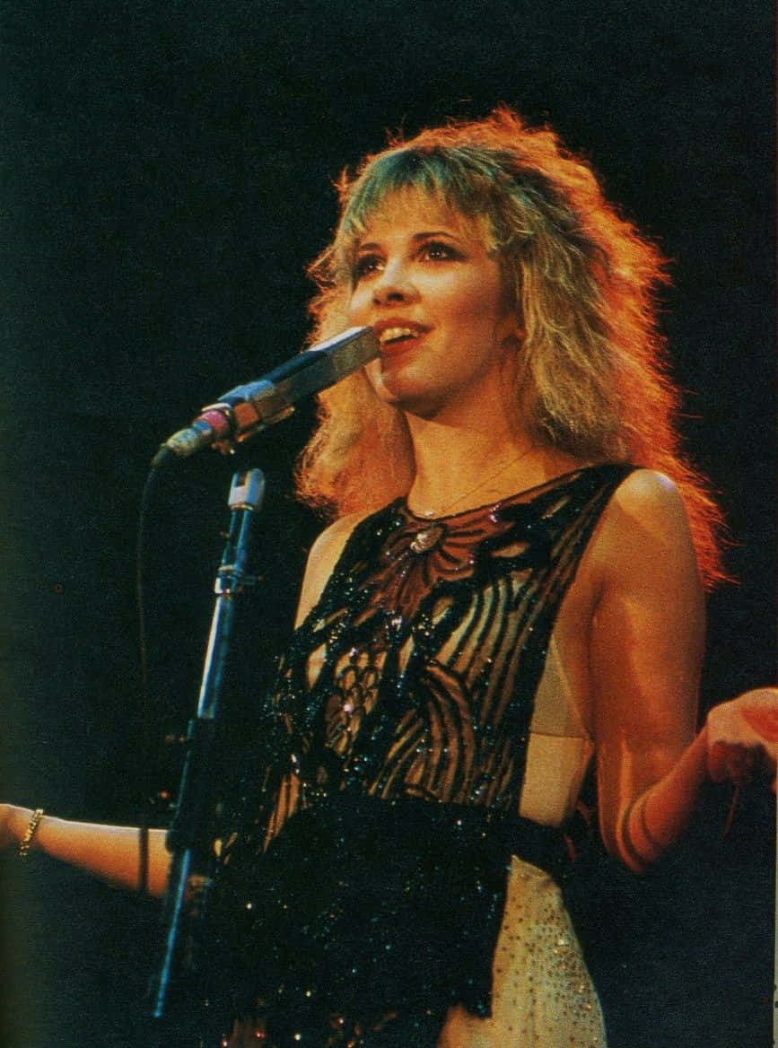 Stevie Nicks, voluminous blonde hair, warm spotlight, SD Phone Wallpaper