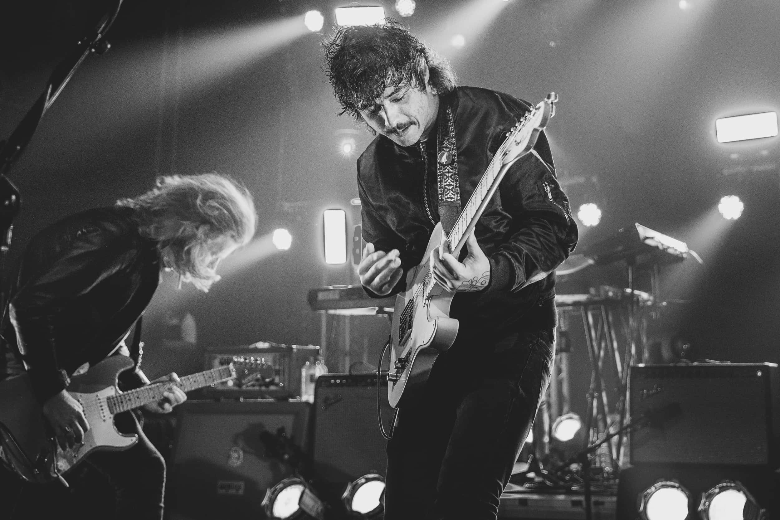 Sticky Fingers, guitarists, dimly lit stage, Full HD Desktop Wallpaper