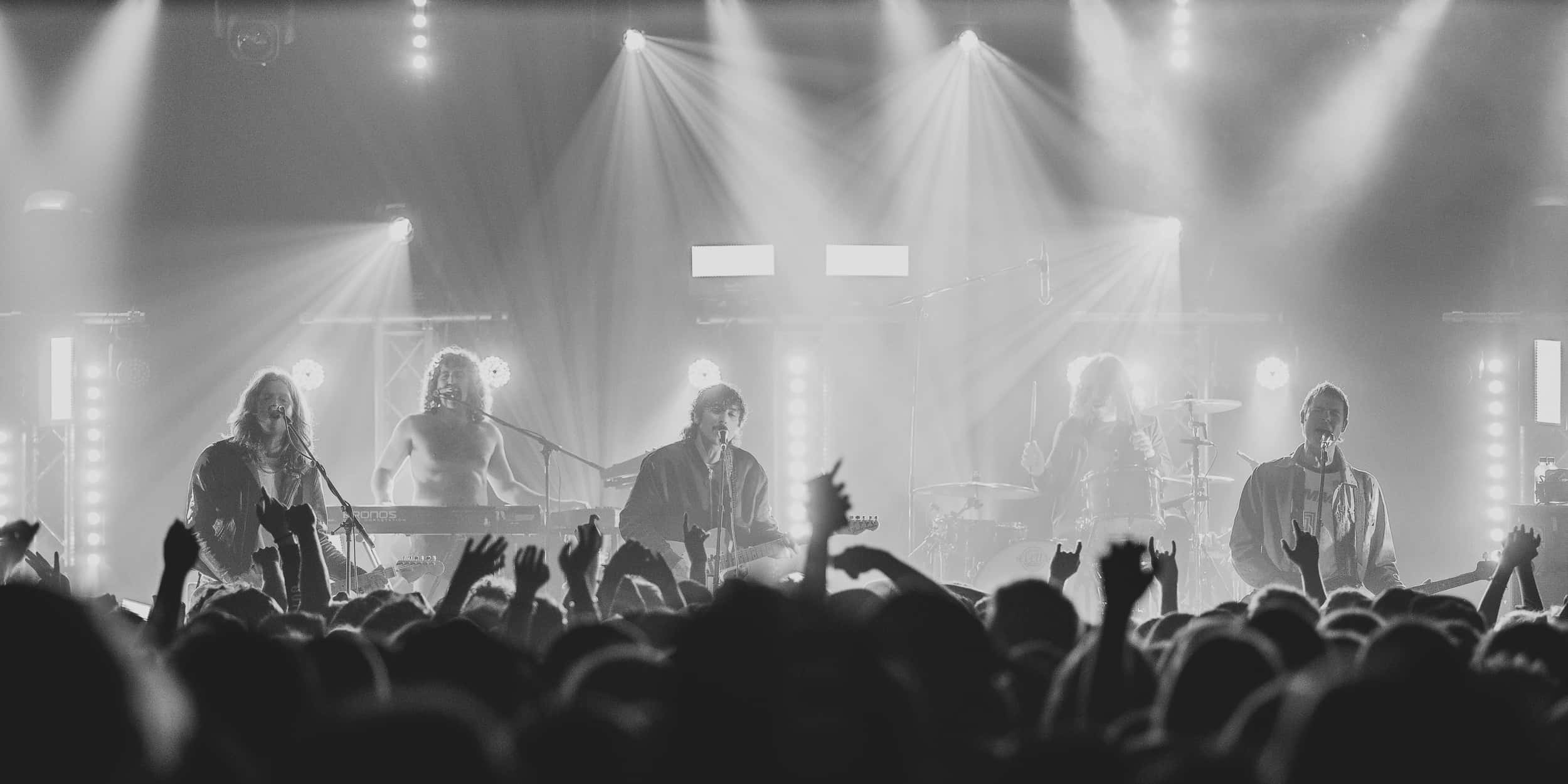 Sticky Fingers, black and white concert scene, band members on stage, Full HD Desktop Wallpaper