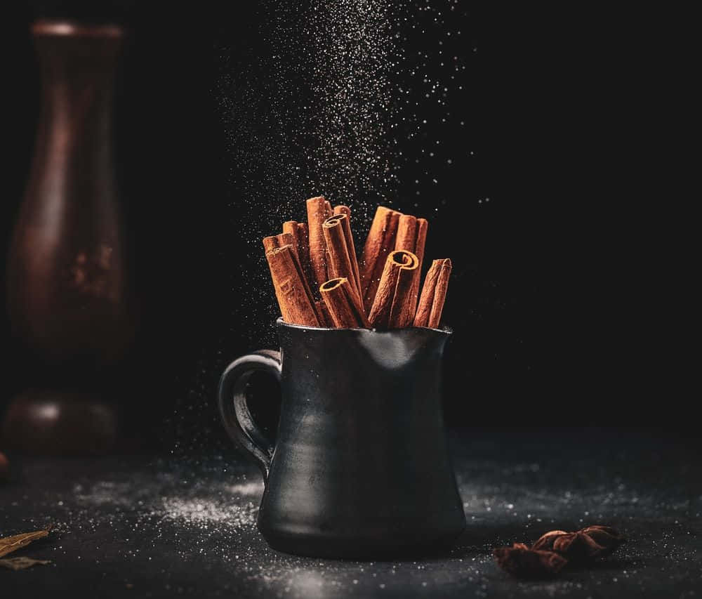 cinnamon sticks, cinnamon powder, black ceramic mug, SD Desktop Wallpaper