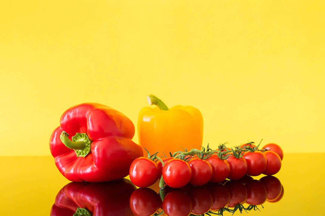 bell peppers, cherry tomatoes, reflective yellow surface, SD Desktop Wallpaper
