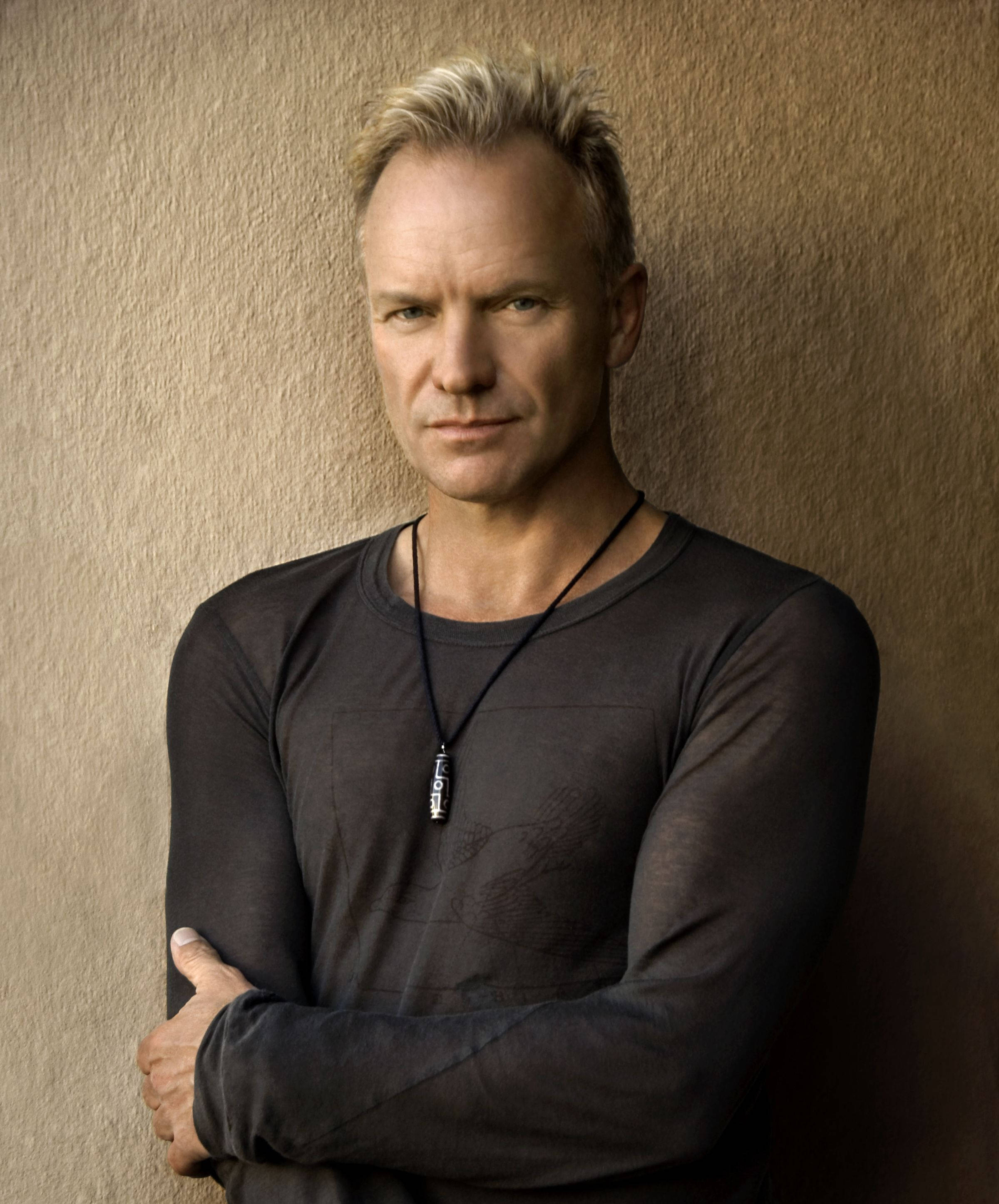 Sting, black sweater, blond hair, 2K Phone Wallpaper