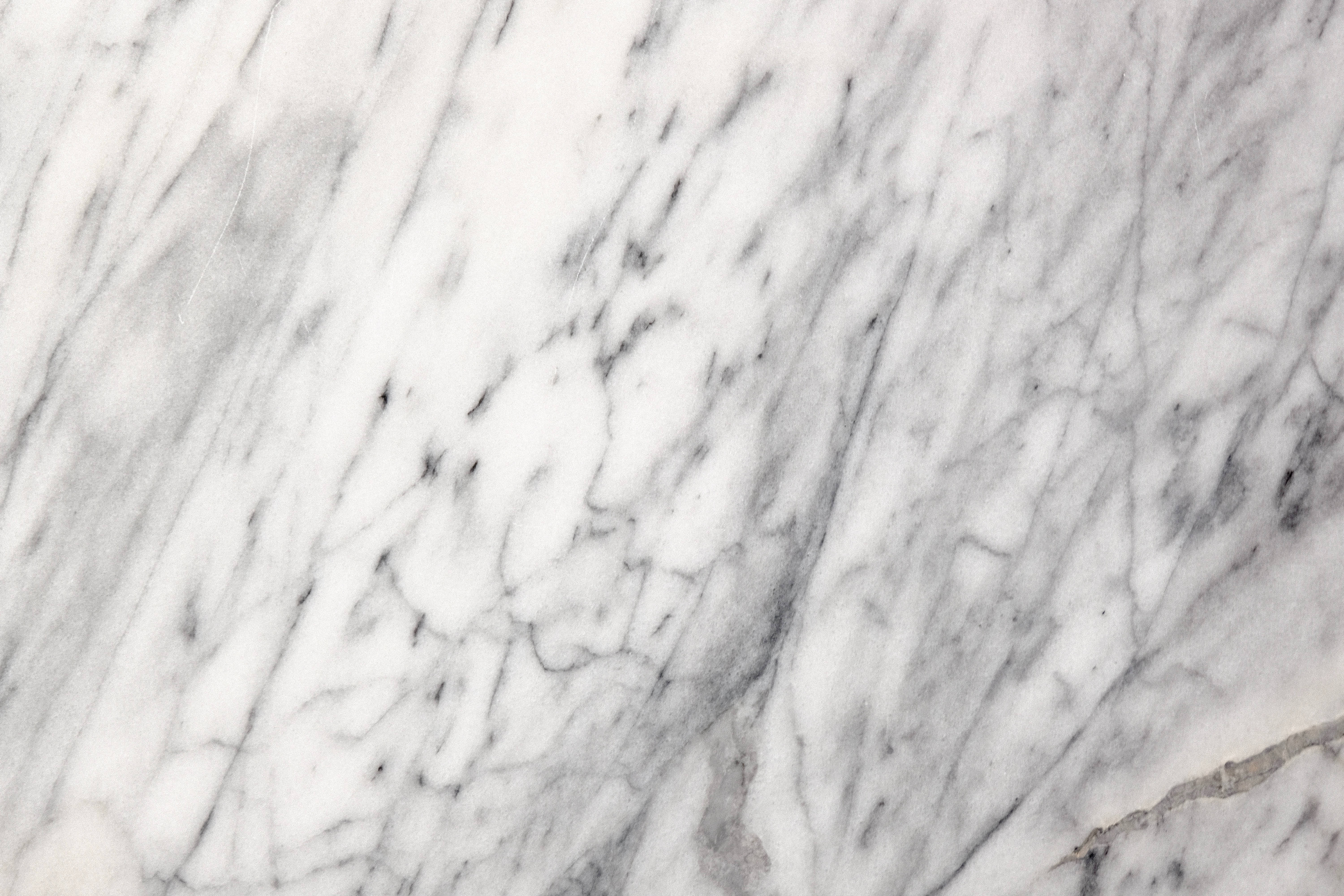 white stone marble, swirling gray veins, subtle natural cracks, 5K Desktop Wallpaper