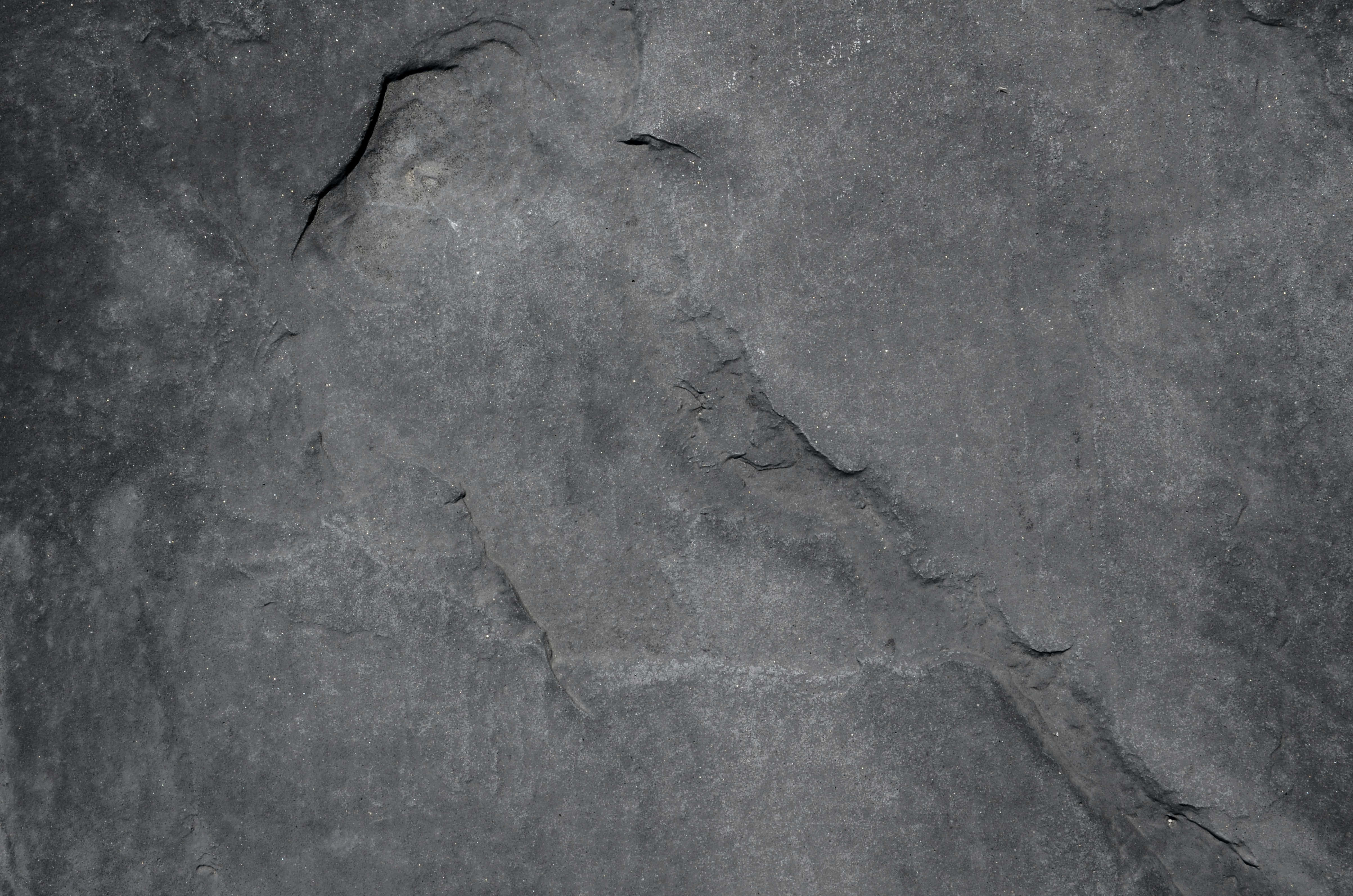 sharp ash color, raw stone texture, rough dark gray rock surface, 4K Desktop Wallpaper