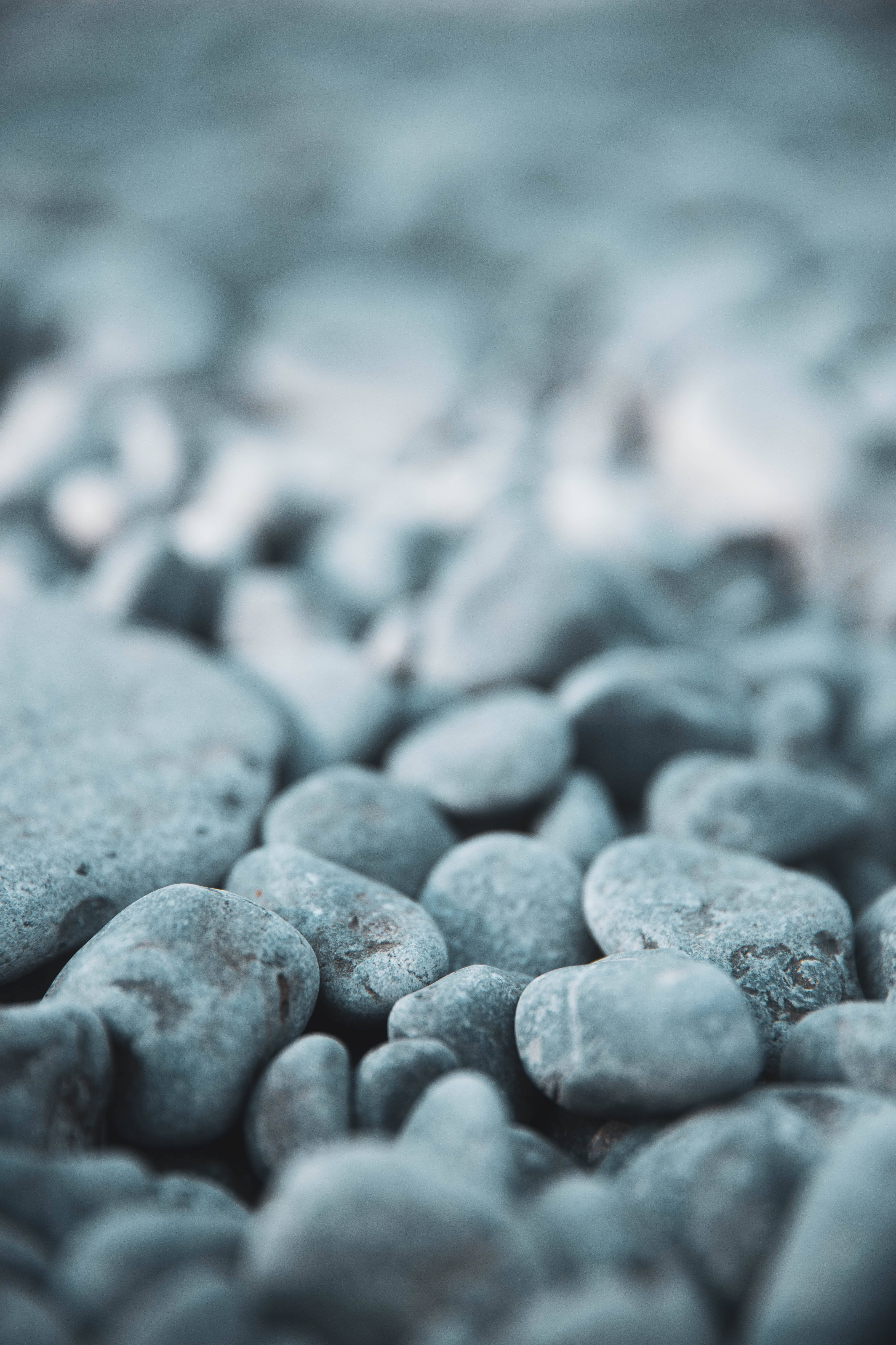 gray stone, smooth gray river rocks, cool blue-gray tones, 5K Phone Wallpaper