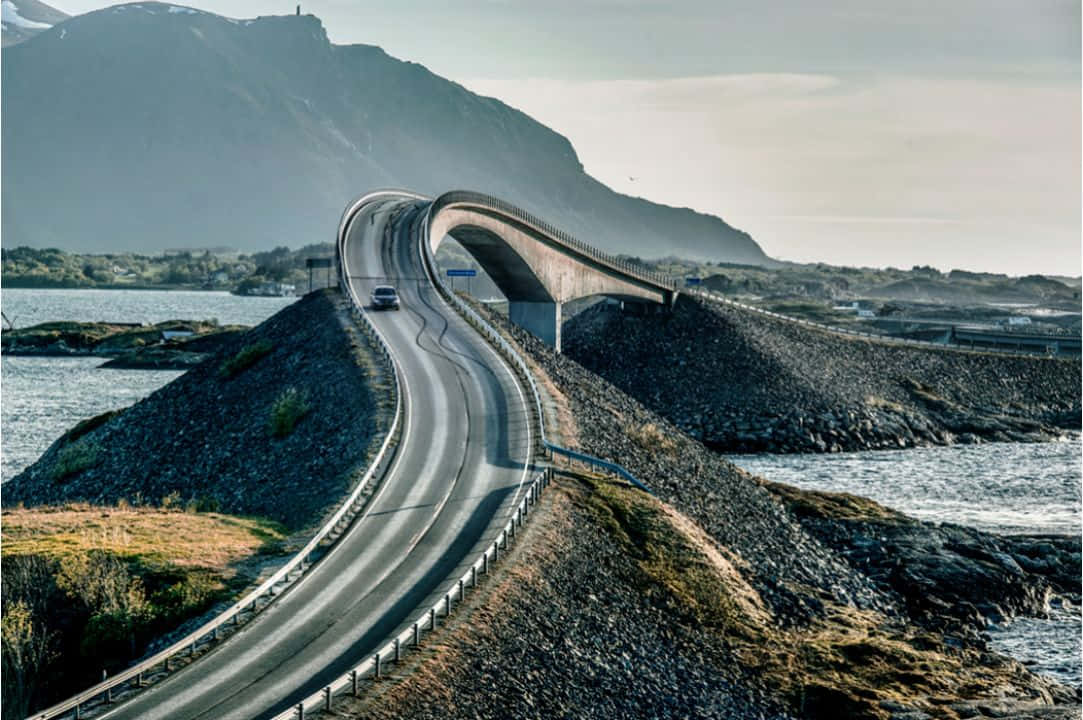 Storseisundet Bridge, winding road, rocky shores, SD Desktop Wallpaper