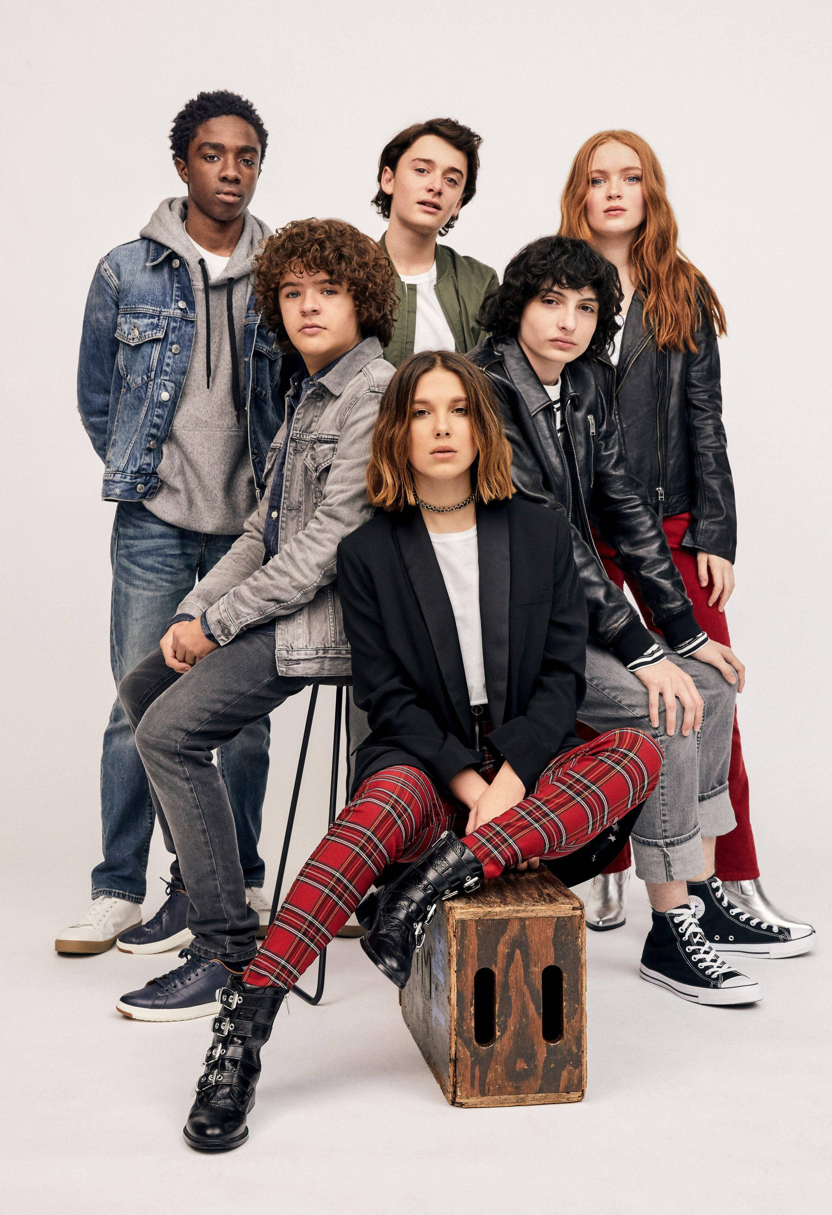Stranger Things Cast, edgy streetwear, white studio backdrop, 4K Phone Wallpaper