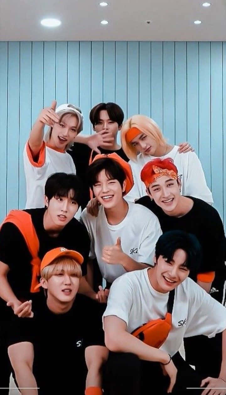 Stray Kids OT8, white and black outfits, orange accents, SD Phone Wallpaper