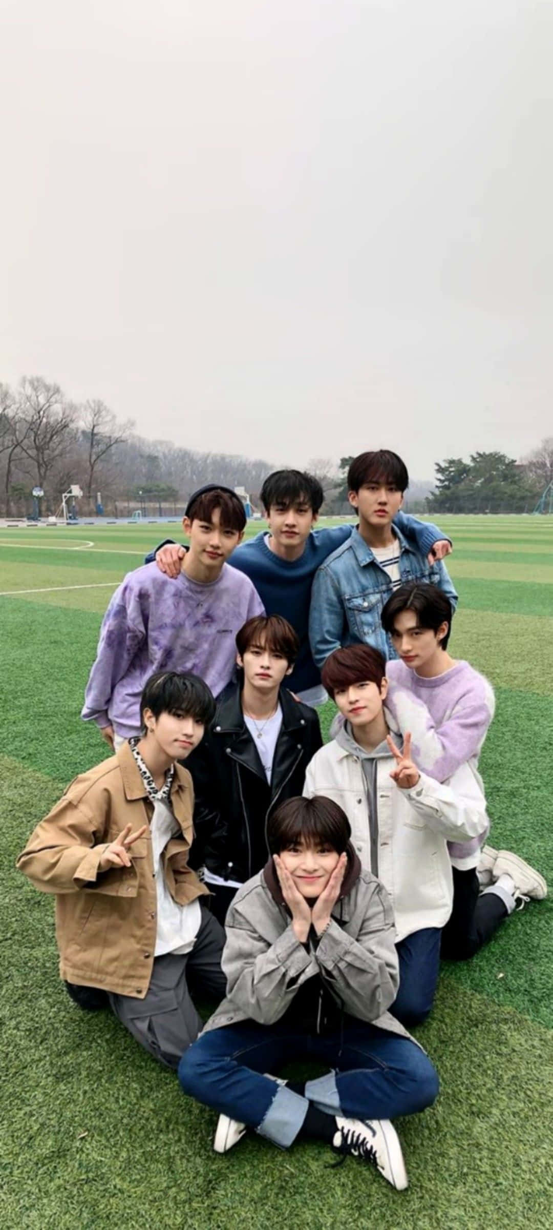 Stray Kids Ot8, green sports field, overcast sky, Full HD Phone Wallpaper