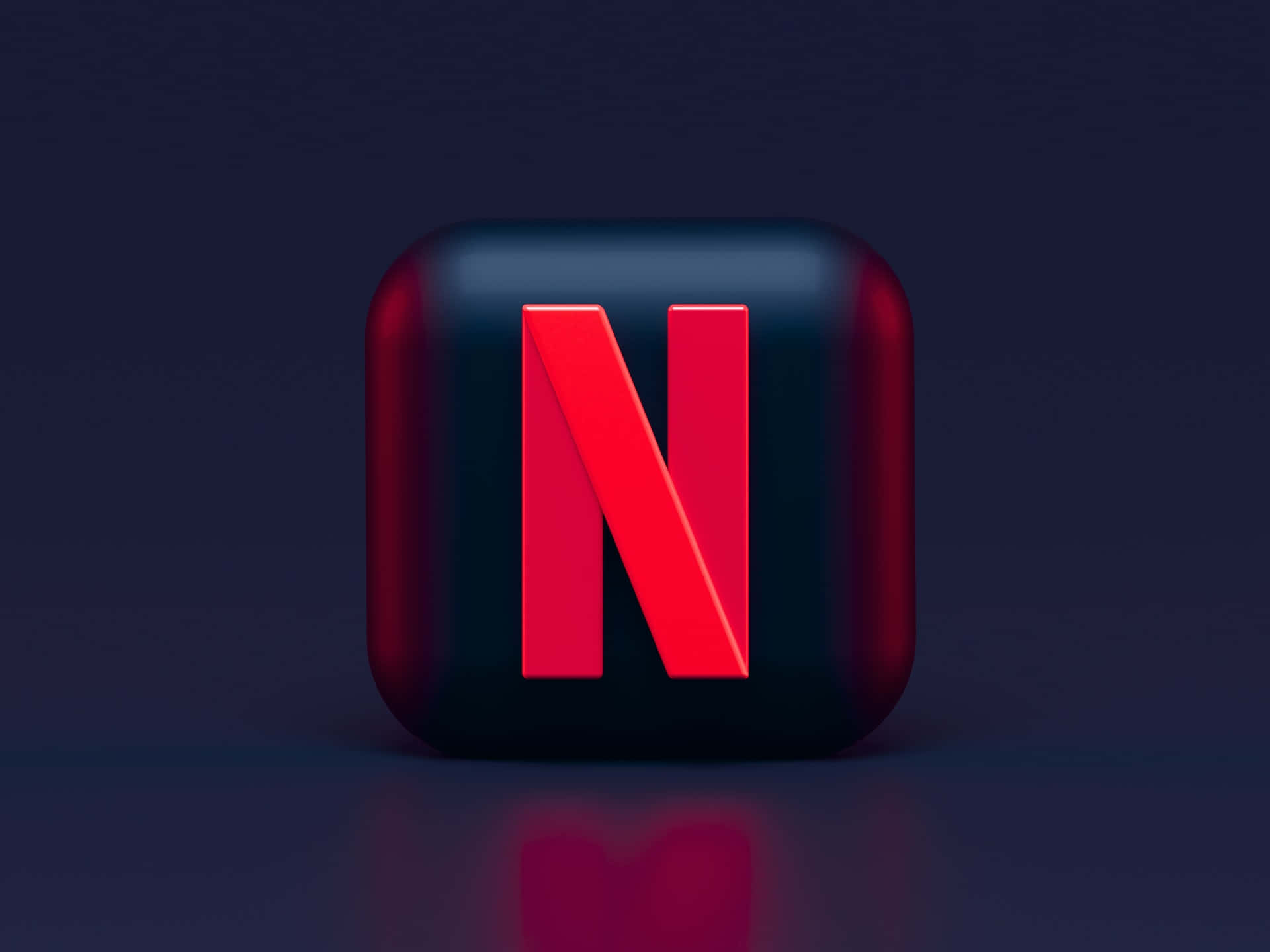 glossy black cube, bold red Netflix logo, dark blue gradient background, Full HD Desktop Wallpaper