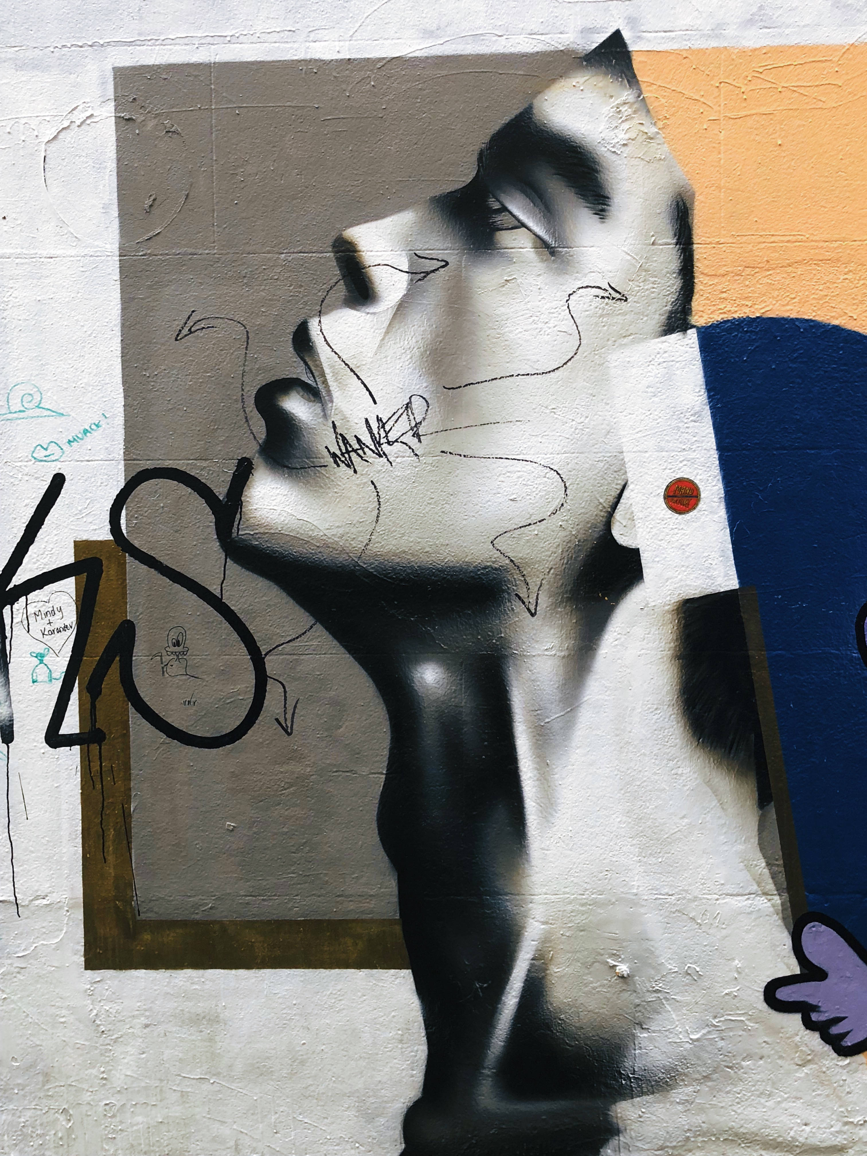 black and white graffiti mural, stylized human face in profile, abstract lines, 4K Phone Wallpaper